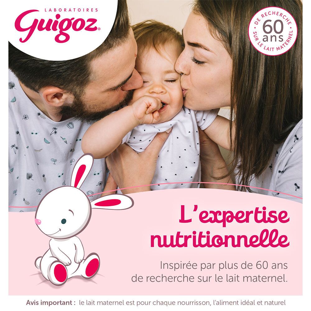 Parents embrassant bébé. Expertise Guigoz : Plus de 60 ans de recherche sur le lait maternel. Avec lapin.