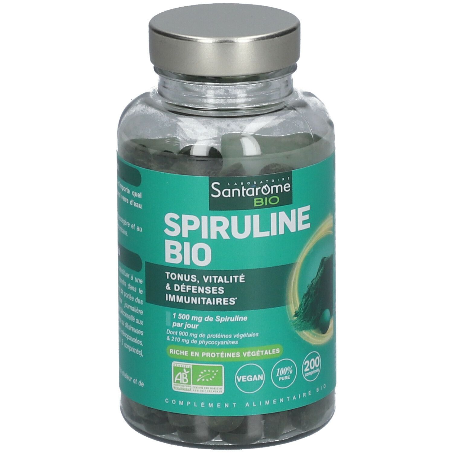 Flacon en verre avec comprimés verts. Inscription Santarome BIO Spiruline Bio. Bouchon. Texte en français.