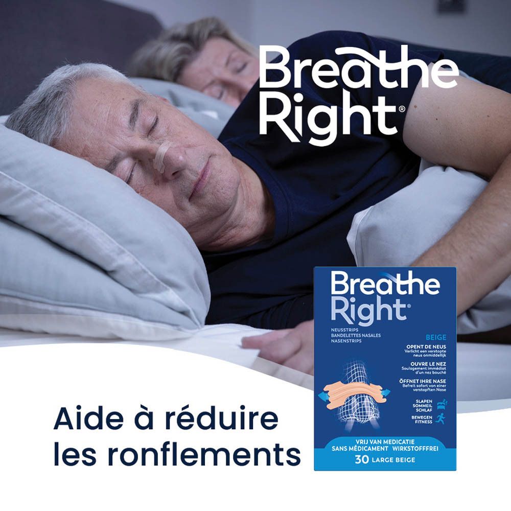 Bandelettes nasales Breathe Right® Beige Large à côté d'un couple endormi.
