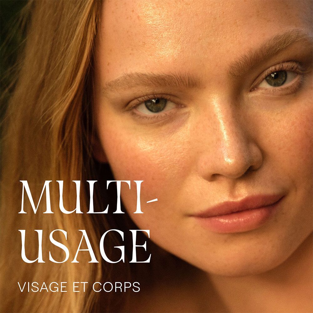 Gros plan d'un visage. Inscription: MULTI-USAGE VISAGE ET CORPS.
