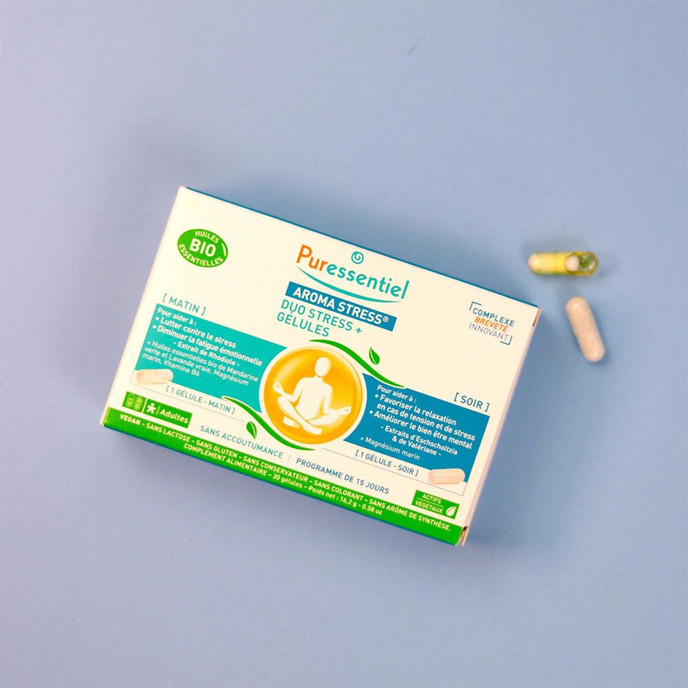 Boîte Puressentiel AROMA STRESS® Gélules Duo Stress + avec gélules. Sur fond bleu.