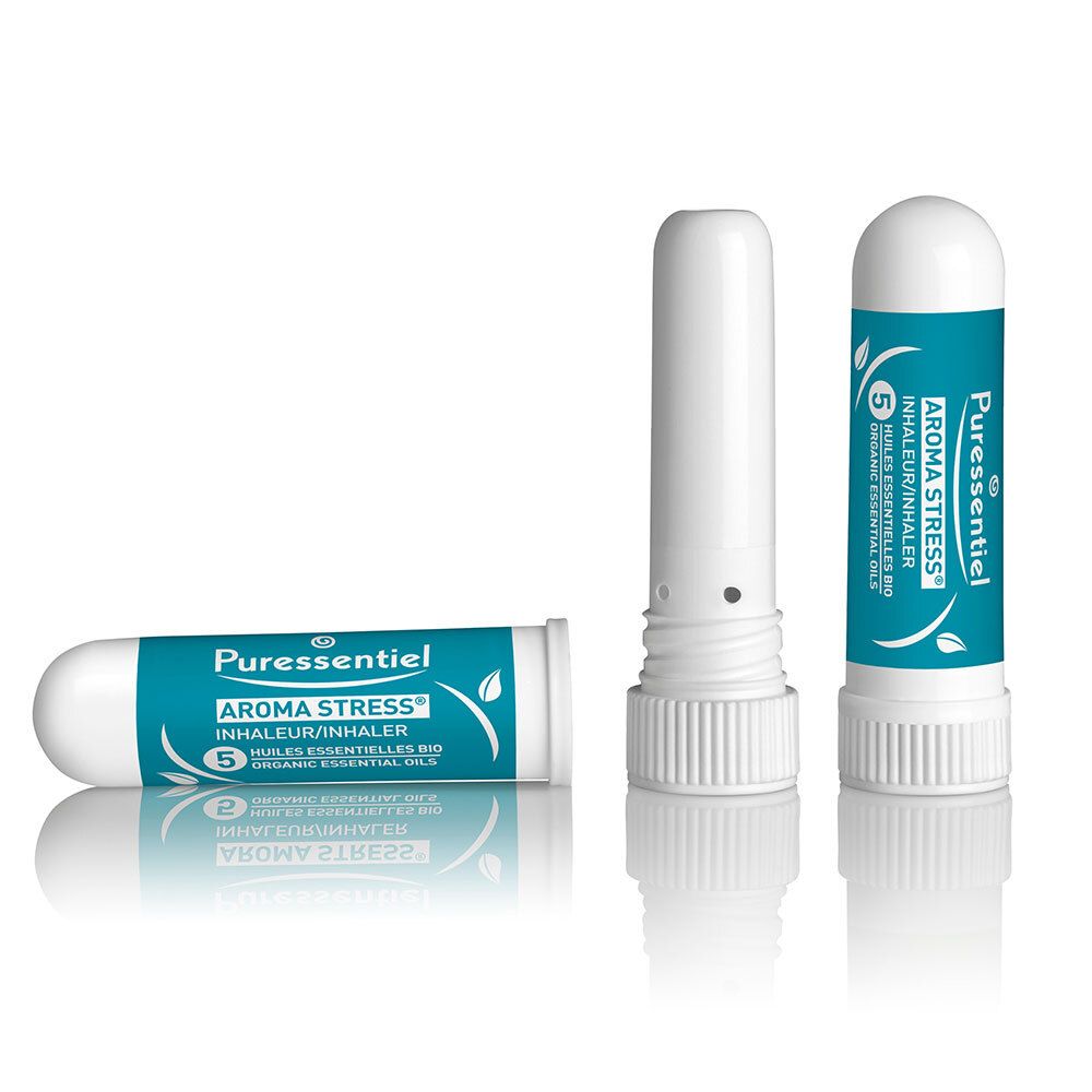 Trois inhalateurs Puressentiel AROMA STRESS® blancs. Inscription : AROMA STRESS® Inhaler/Inhalateur.