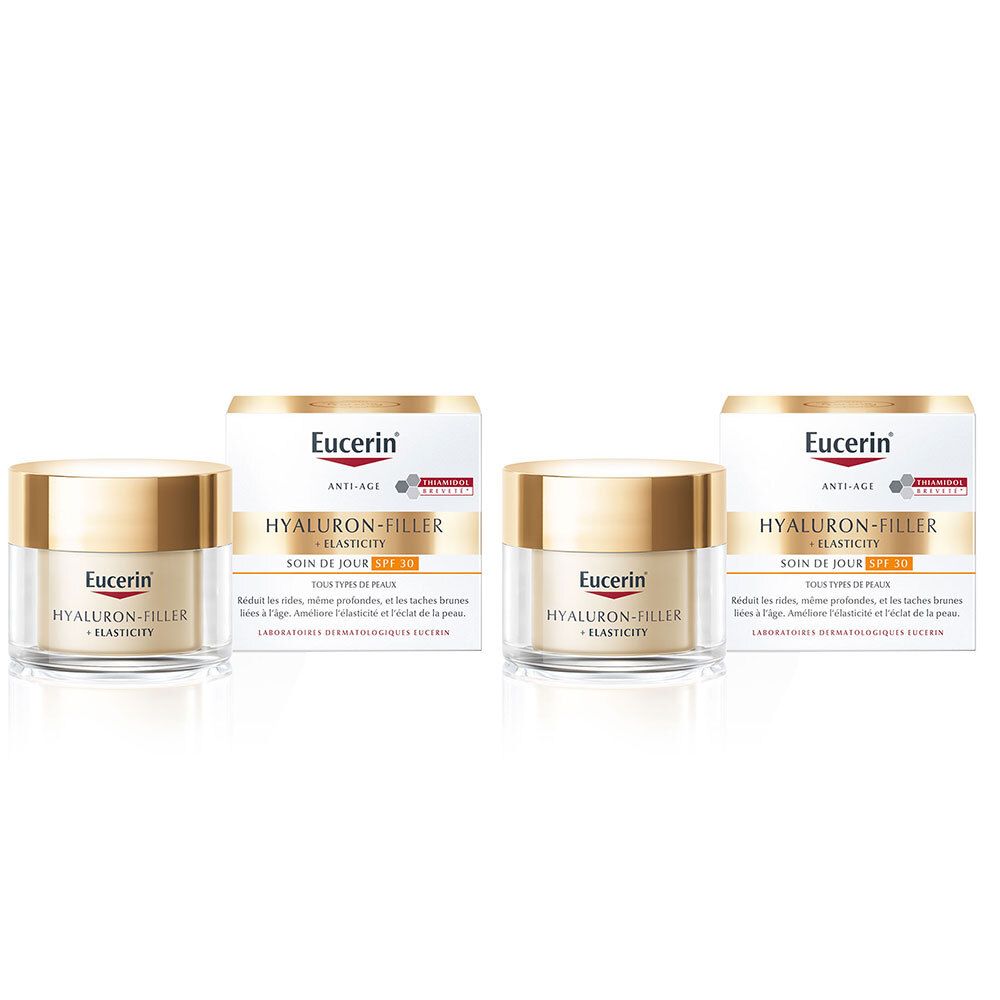Plusieurs pots et boîtes de crème. Inscription: Eucerin HYALURON-FILLER + ELASTICITY Soin de Jour SPF 30.