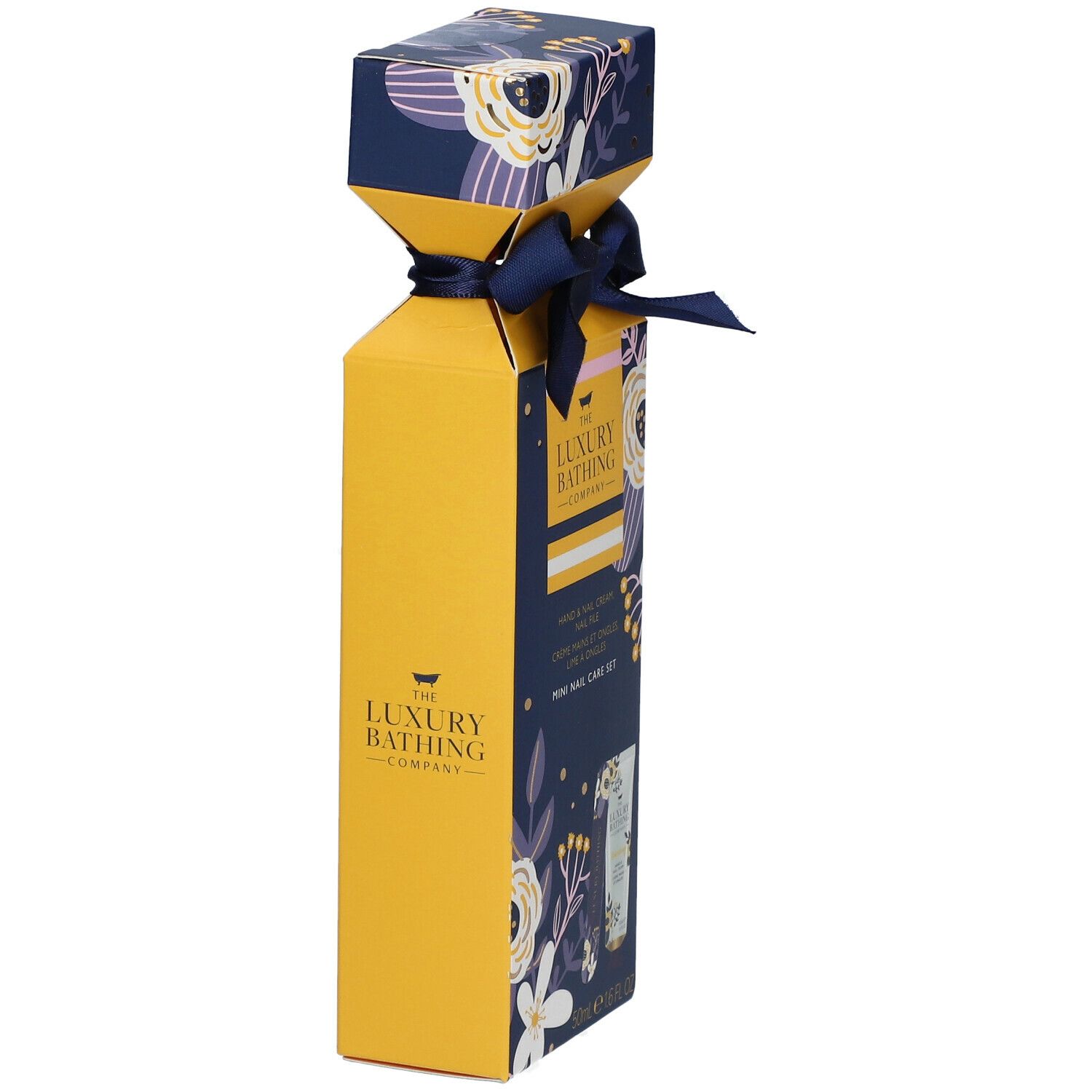 Coffret cadeau jaune avec ruban bleu. Inscription: The Luxury Bathing Company. Motif floral. Mini-kit de soins des ongles.