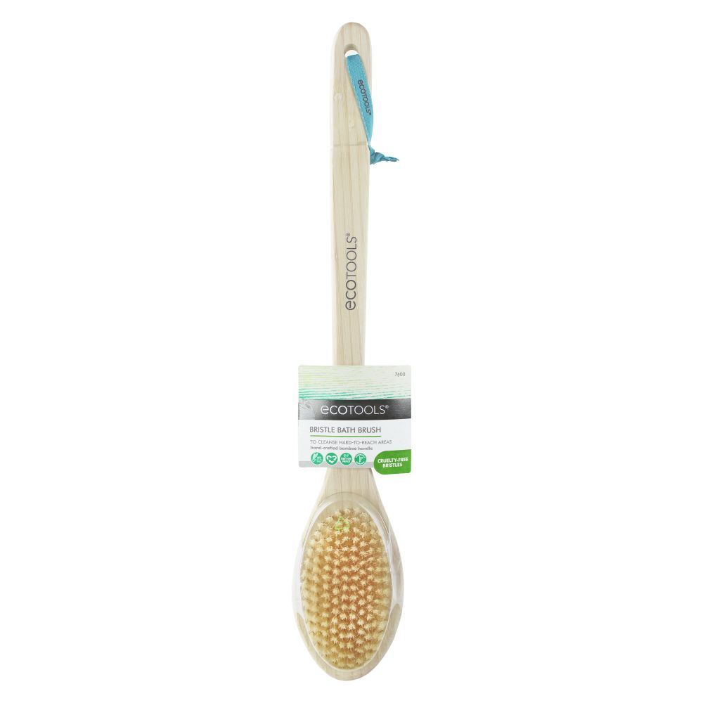 Brosse de bain avec long manche en bois et poils naturels. Étiquette du produit avec logo et texte.