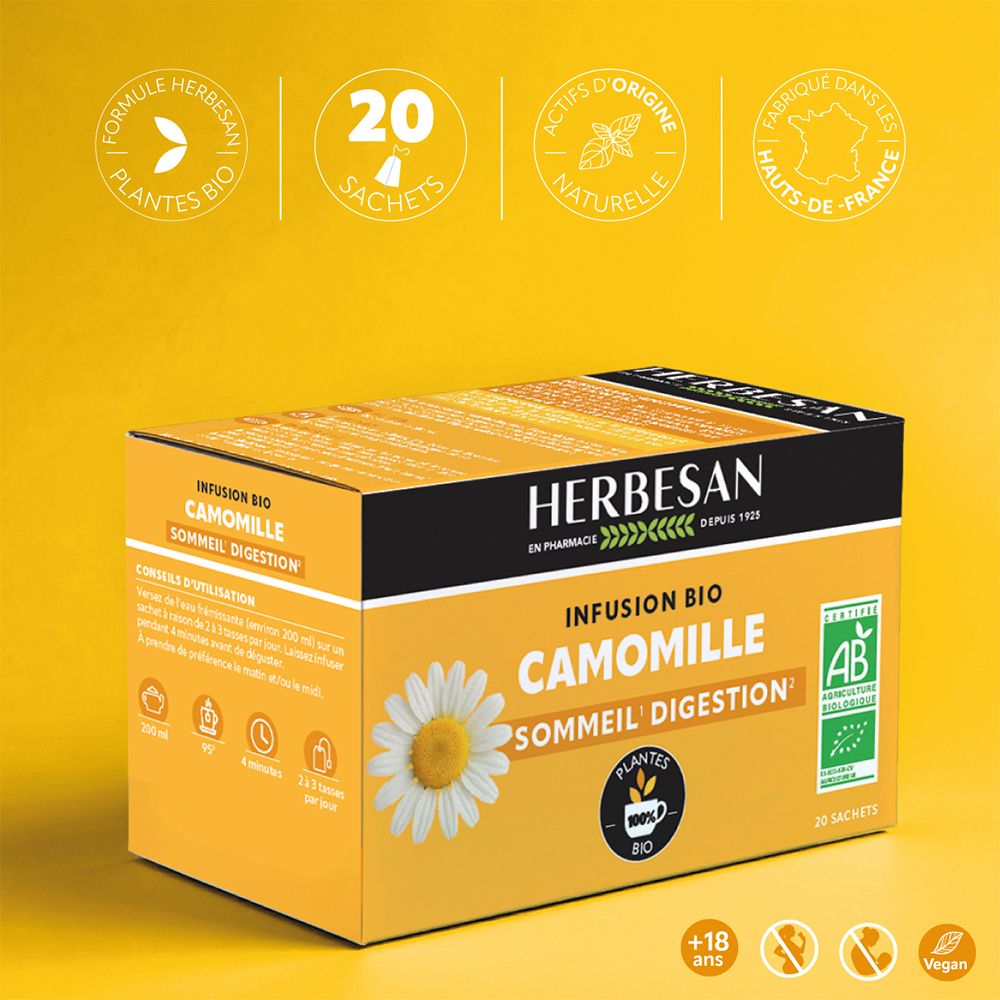 Boîte jaune avec logo Herbesan et fleur de camomille. Texte : Infusion Bio Camomille Sommeil Digestion. 20 sachets, label bio.