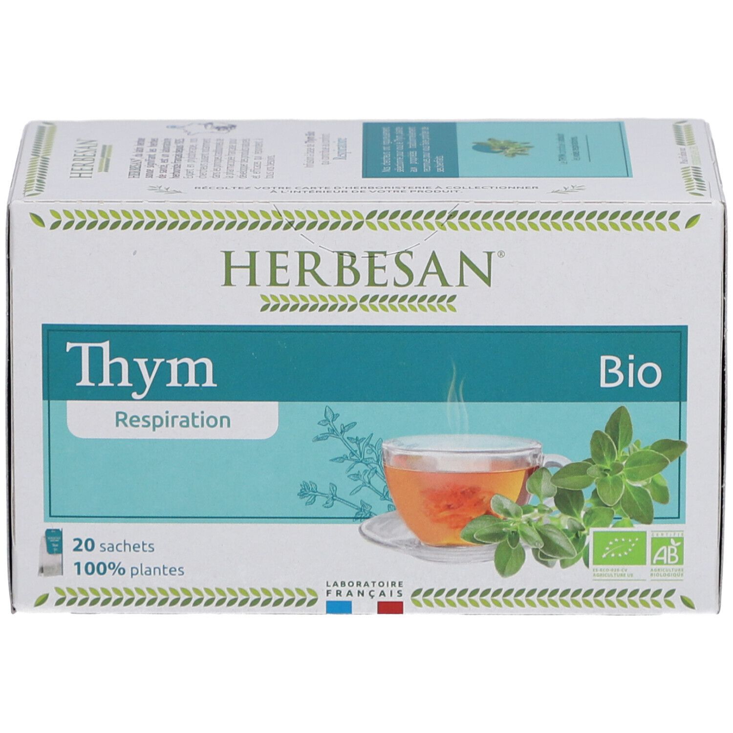 Boîte de thé Herbesan Bio Thym. Inscription : Thym, Bio, 20 sachets, 100% plantes. Image de thé et de thym.