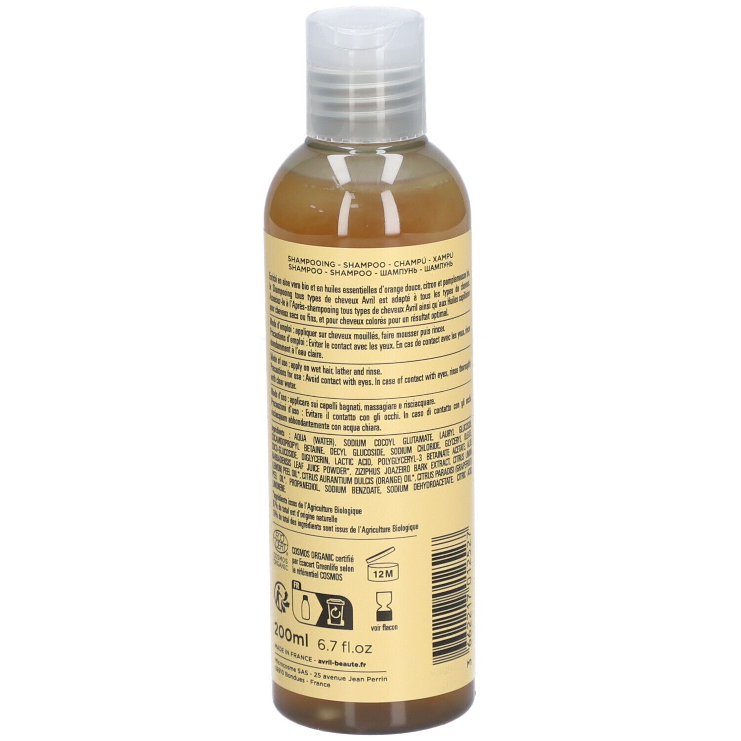Dos du flacon de shampooing. Ingrédients et instructions. Certification bio et indication de volume.