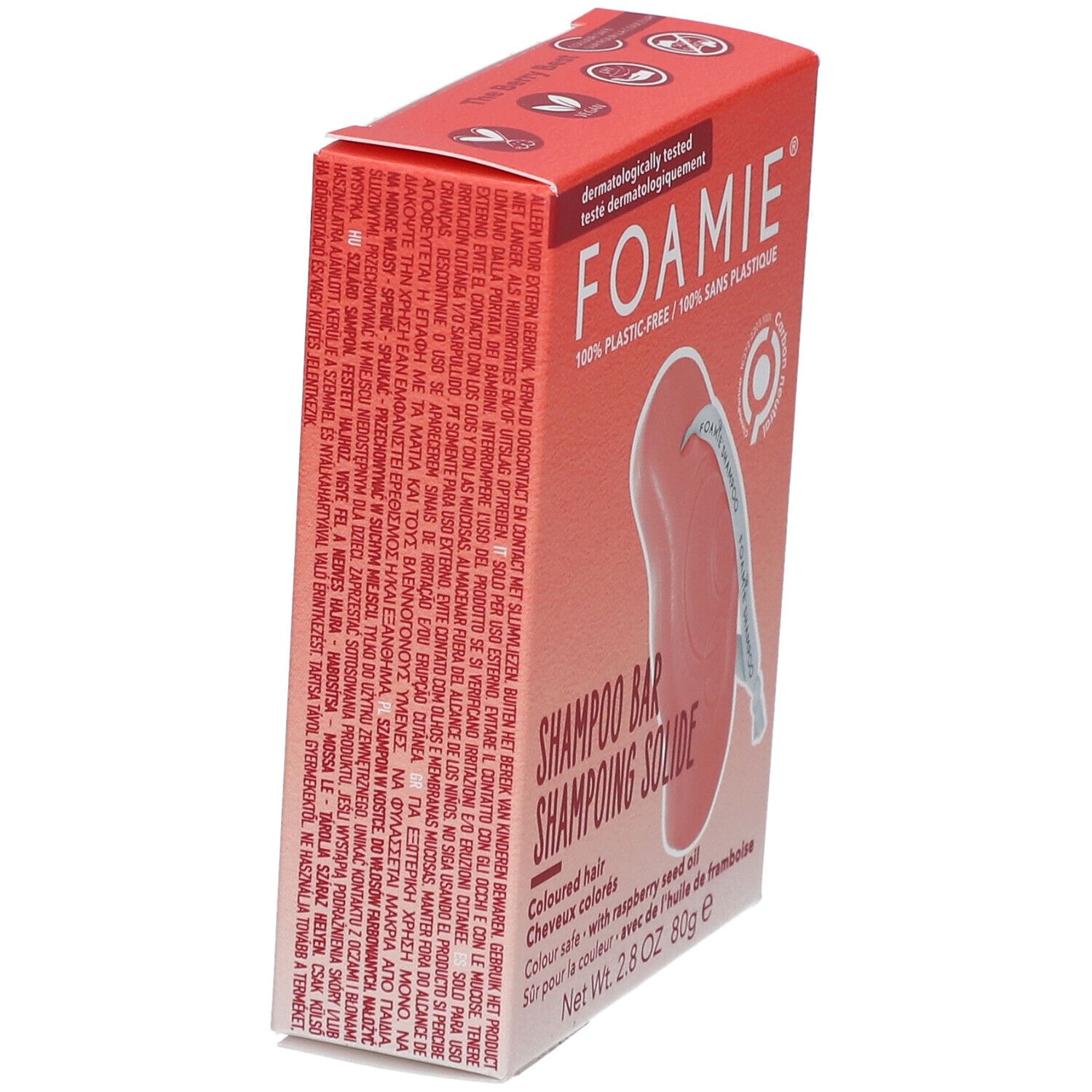 Boîte rouge avec Shampooing Solide. Inscription : FOAMIE, Shampooing Solide, pour cheveux colorés. Contient de l'huile de framboise. Vue latérale.