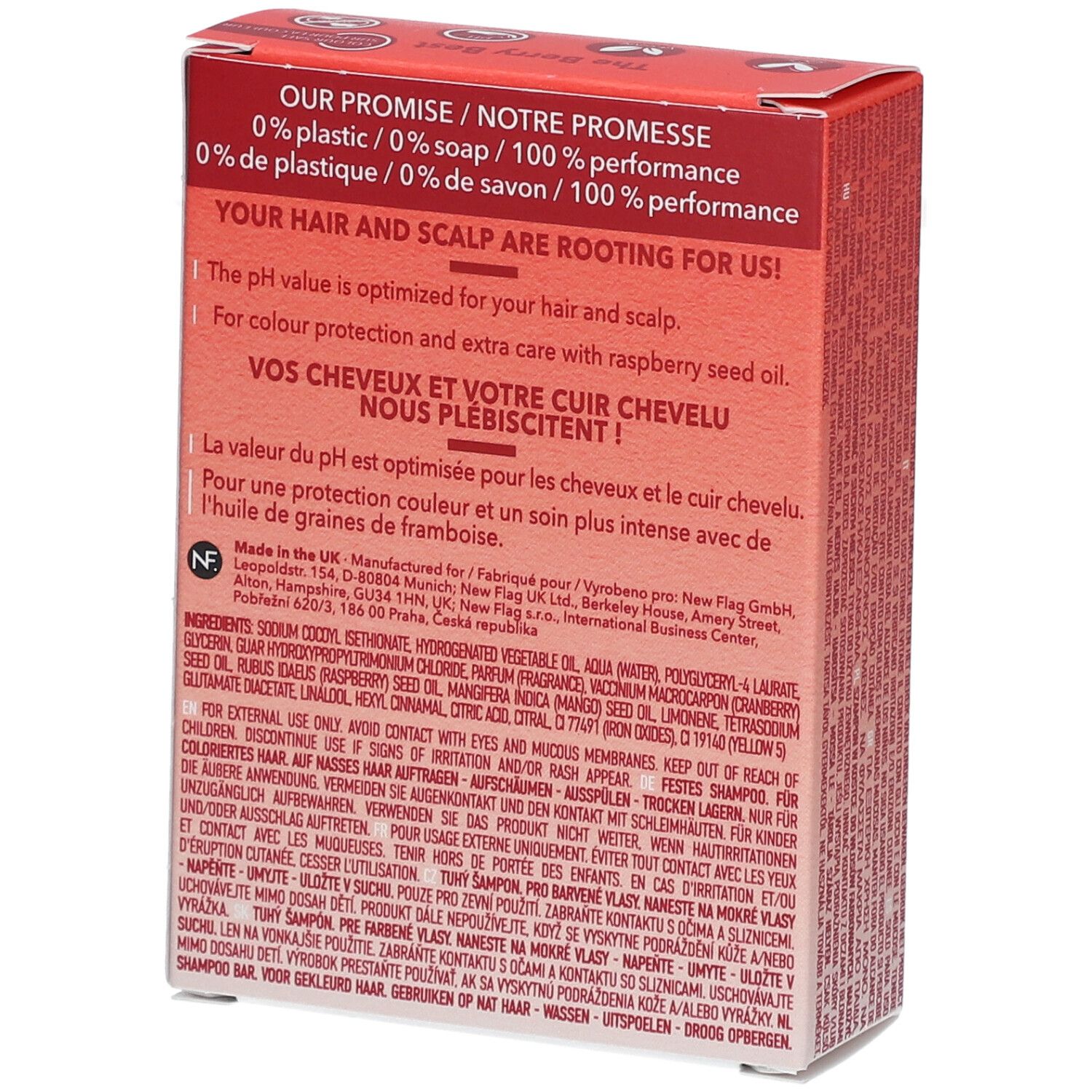 Dos d'une boîte rouge avec Shampooing Solide. Texte : 0% plastique, 0% savon, 100% performance. Ingrédients et informations fabricant.