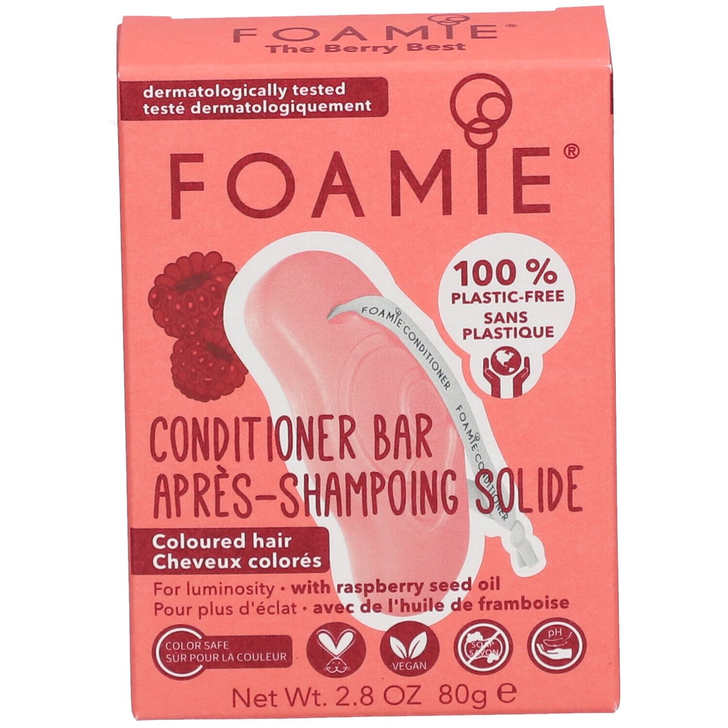 Emballage en carton rose avec informations produit. Inscriptions : FOAMIE, Après-Shampoing Solide, 100% sans plastique. Contient huile de framboise. Vegan.
