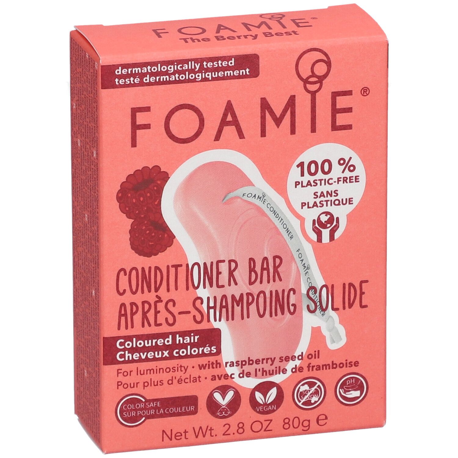 Emballage en carton rose avec informations produit. Inscriptions : FOAMIE, Après-Shampoing Solide, 100% sans plastique. Contient huile de framboise. Vegan.