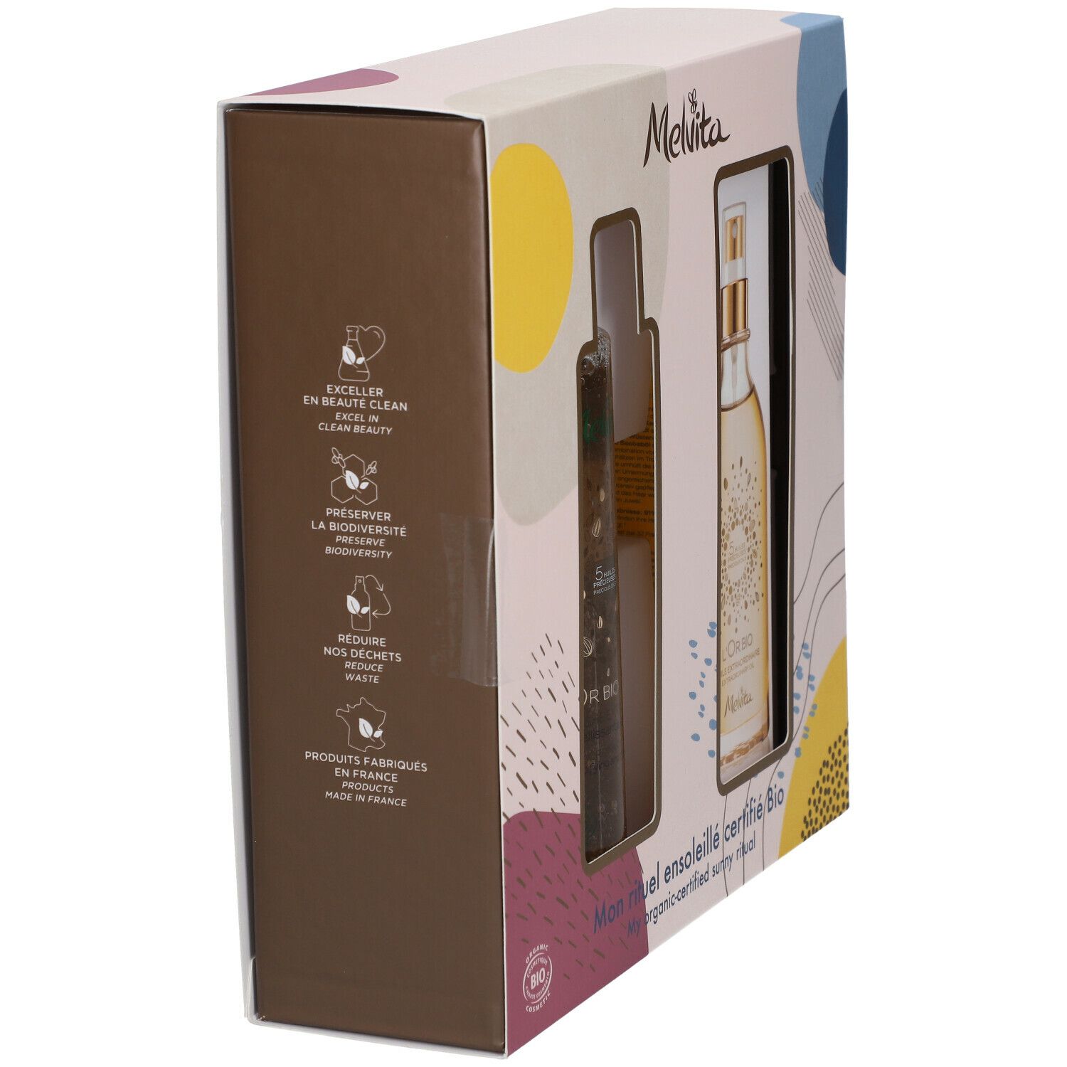 Coffret Melvita avec deux produits, vue latérale. Inscription : Mon rituel ensoleillé certifié Bio. Logos : Bio, 100% recyclé. Texte : Produits fabriqués en France.