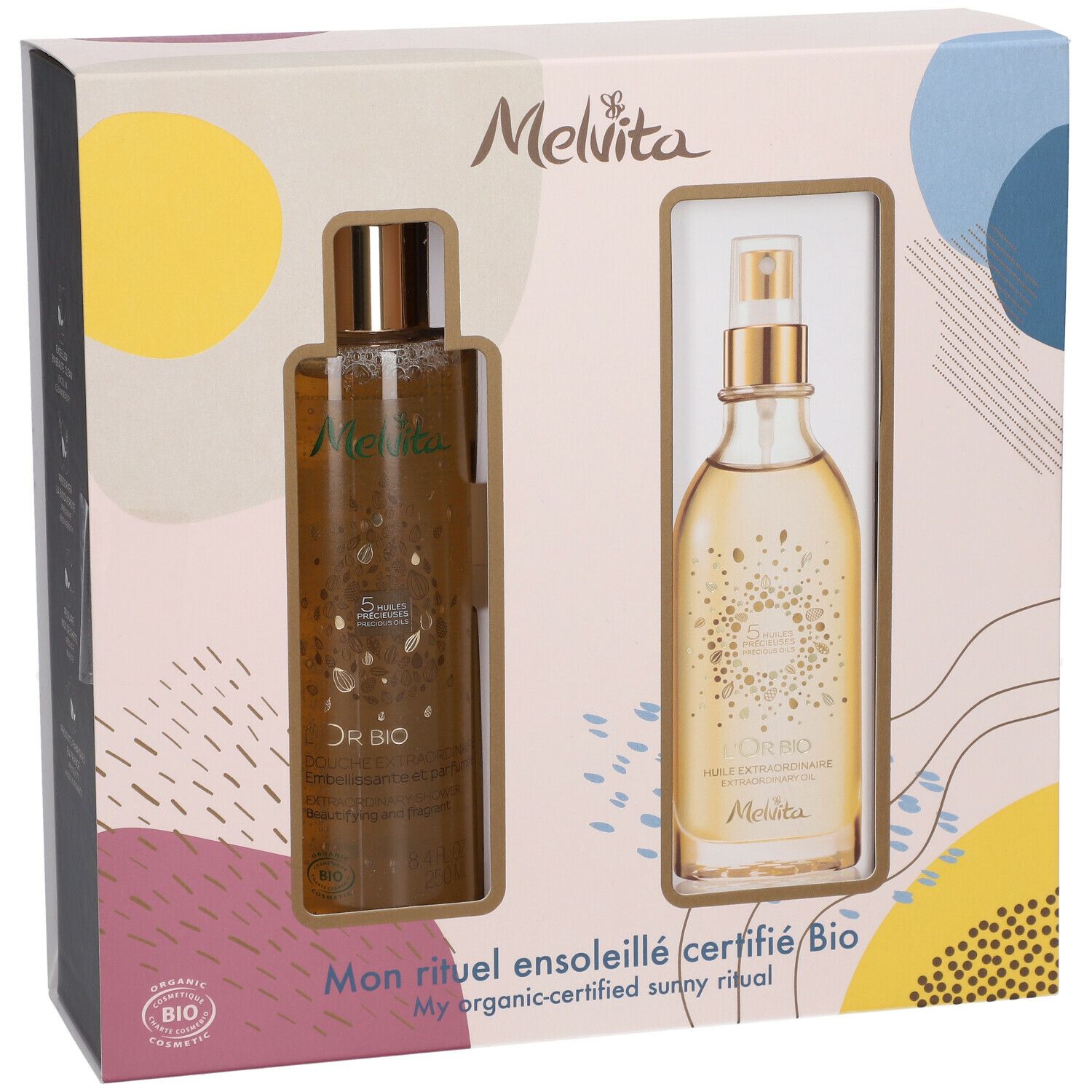 Coffret avec deux produits Melvita. Flacon avec vaporisateur et flacon avec bouchon à vis. Inscription : L'Or BIO, Mon rituel ensoleillé certifié Bio. Certification Bio.