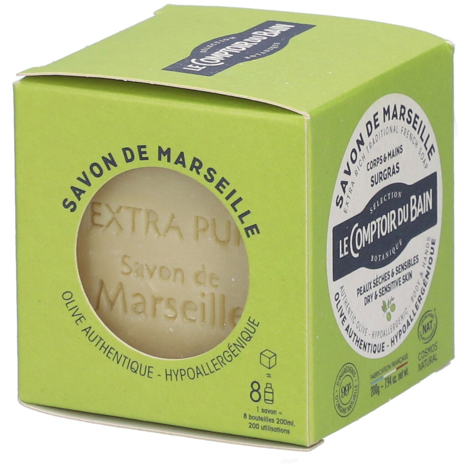 Boîte verte avec trou rond. Visible: savon. Texte: Savon de Marseille, Le Comptoir du Bain. Olive, peaux sèches.