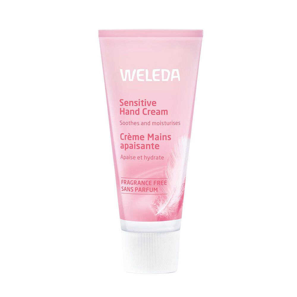Tube rose avec bouchon blanc. Inscription : WELEDA, Sensitive Hand Cream, Crème Mains apaisante, Sans parfum.