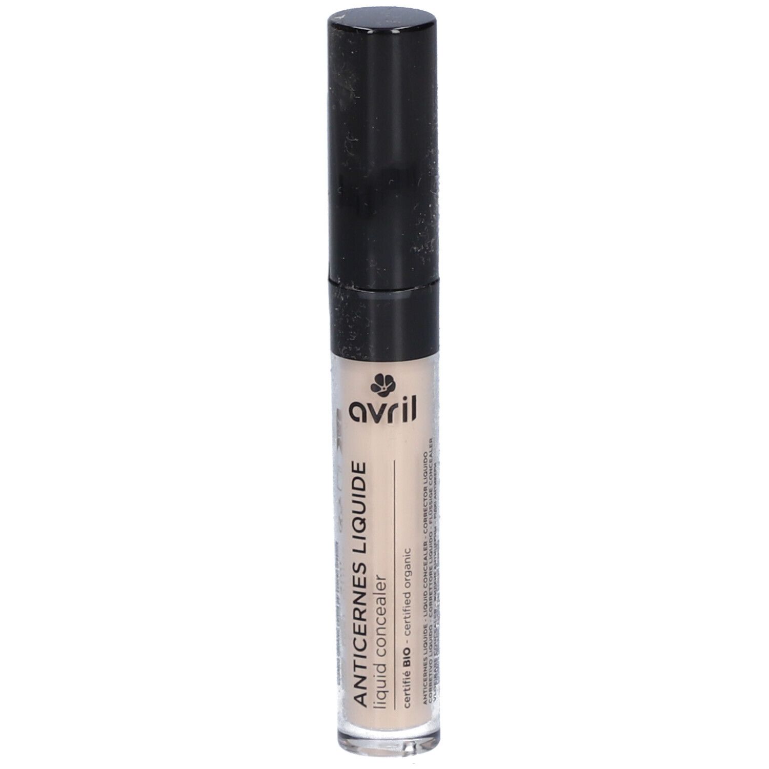 Correcteur liquide en tube transparent avec bouchon noir. Inscription: Anticernes Liquide, Avril. Produit bio certifié.