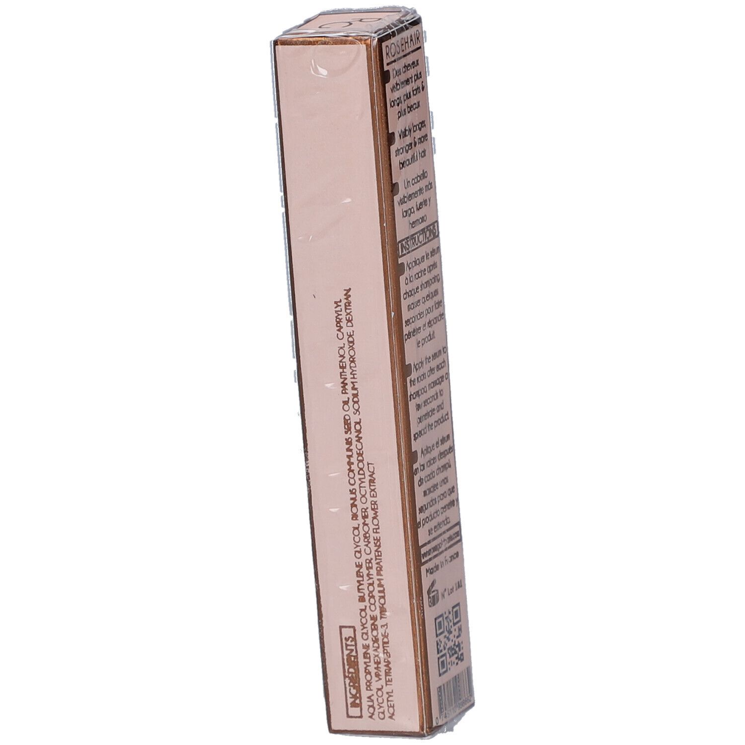 Côté de l'emballage rose. Texte: Ingrédients. ROSEHAIR, Sérum de croissance POUR CHEVEUX A.