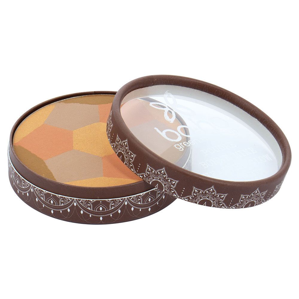 Boîte de cosmétiques ronde ouverte. Contient des teintes hexagonales. Bord marron avec motif blanc. Couvercle transparent.