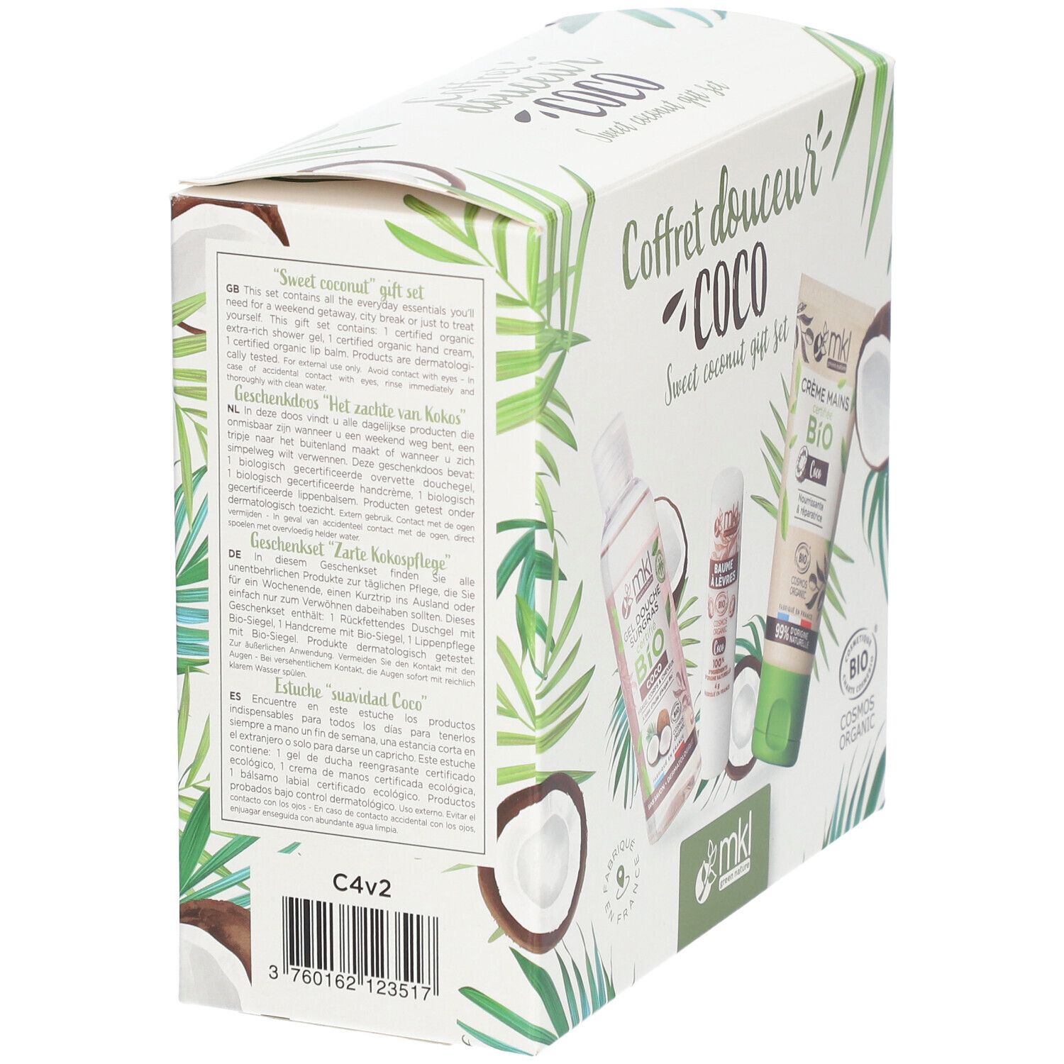 Boîte cadeau blanche avec motifs noix de coco et texte multilingue. Contient trois produits.