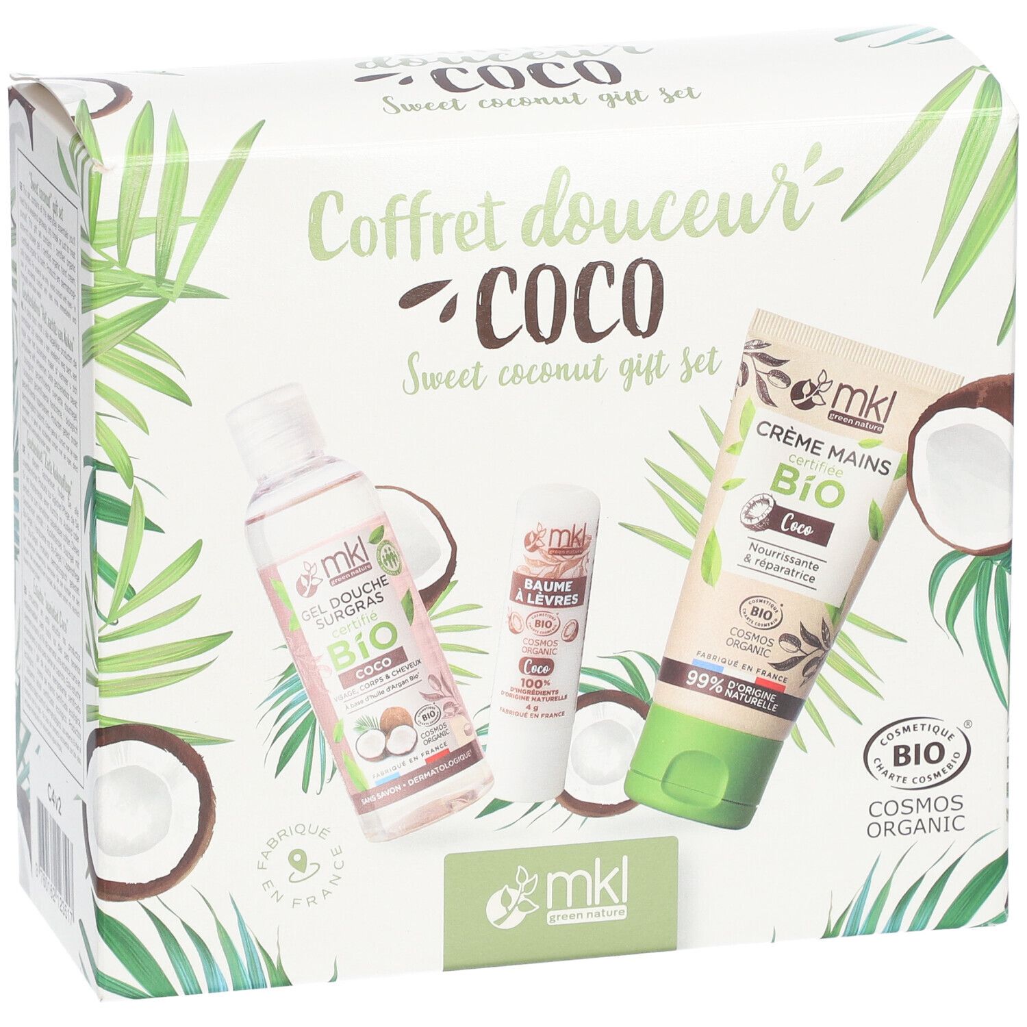 Coffret cadeau avec gel douche, baume à lèvres et crème mains. Emballage avec motifs noix de coco.