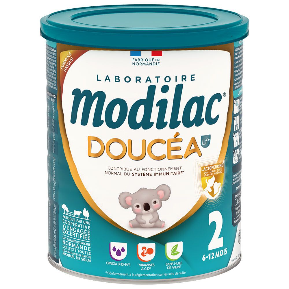 Boîte de lait bébé Modilac Doucéa, 2ème âge. Couvercle bleu, texte blanc et doré. Koala en illustration.