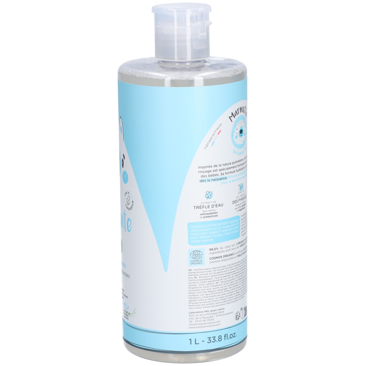 Dos du flacon Baby Green Eau Nettoyante. Texte multilingue. Logo: Marmotte.