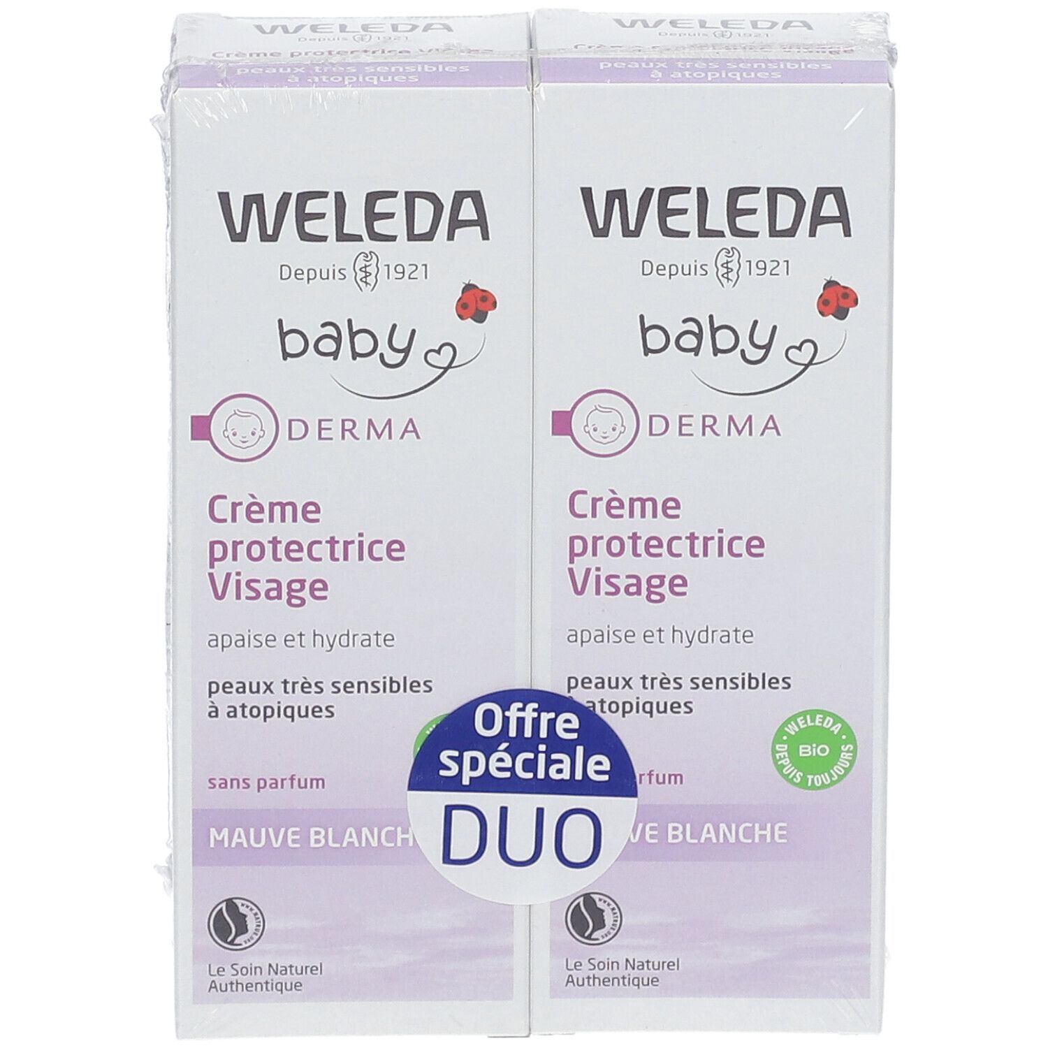 Deux boîtes de Crème protectrice Visage WELEDA Baby. Duo-pack avec emballage blanc et violet. Texte : Mauve Blanche, Bio.