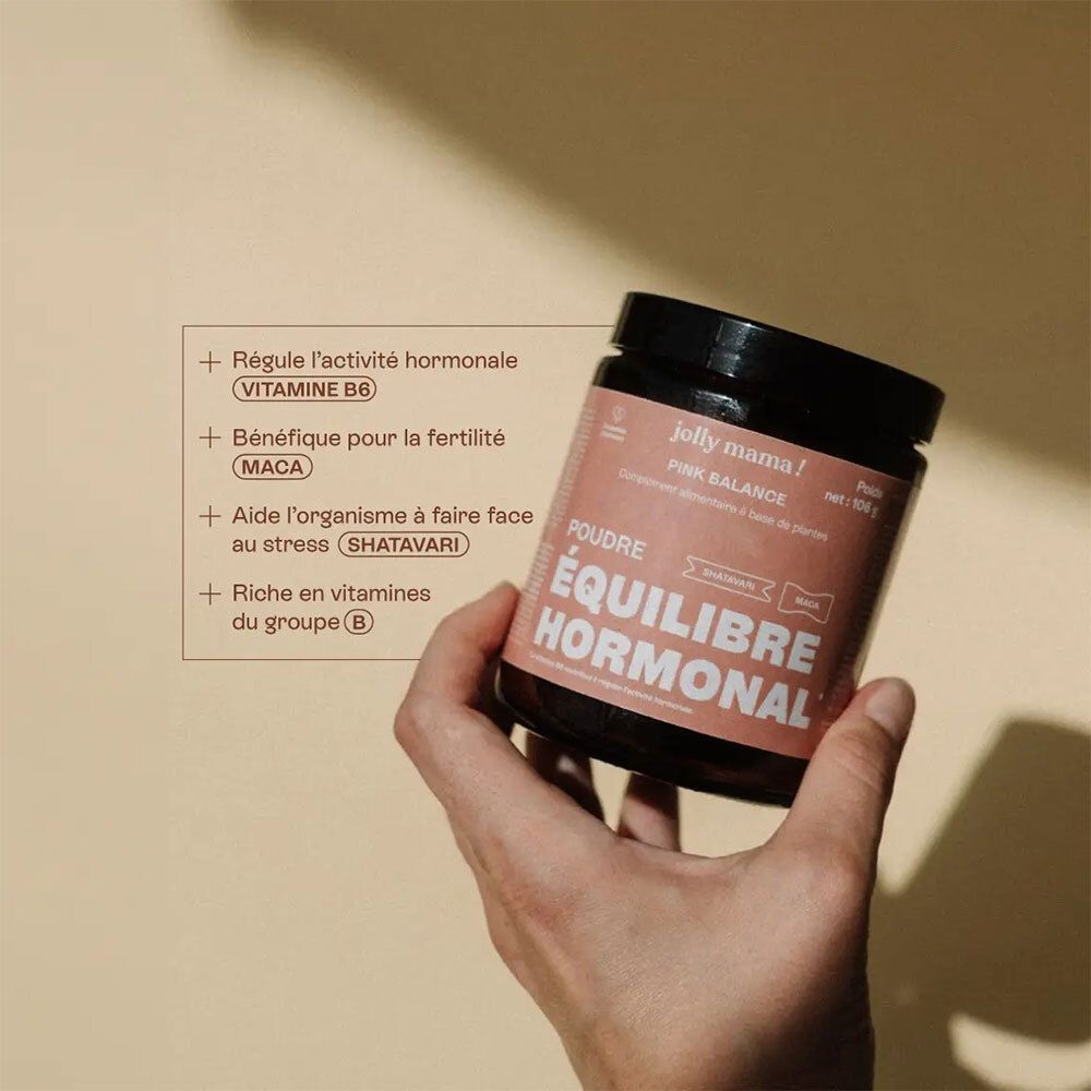 Main tenant un pot JOLLY MAMA Pink Balance. Texte: Poudre ÉQUILIBRE HORMONAL. Inscription: Vitamine B6.