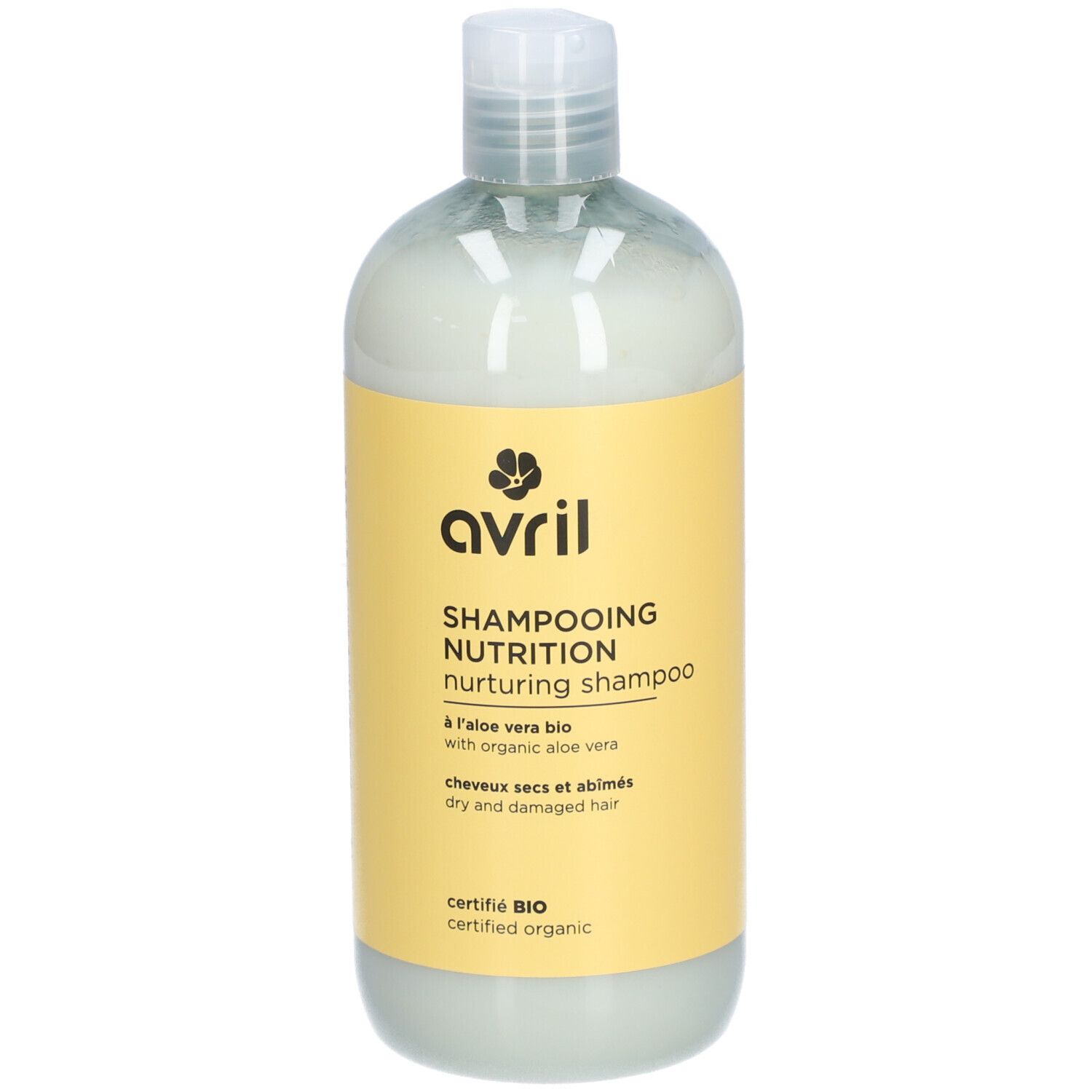 Flacon de Shampooing Nutrition. Étiquette jaune avec logo et texte. Produit bio certifié. Pour cheveux secs et abîmés.