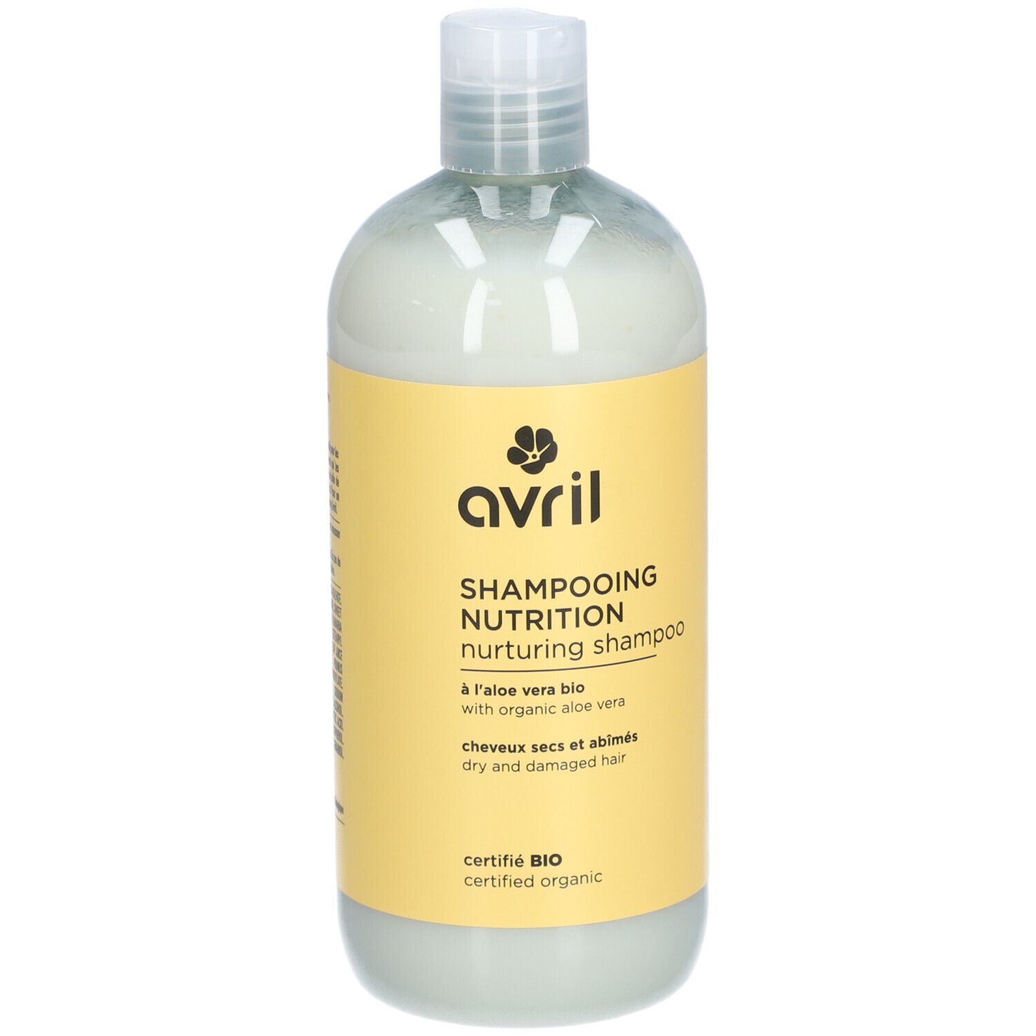 Flacon de Shampooing Nutrition. Étiquette jaune avec logo et texte. Produit bio certifié. Pour cheveux secs et abîmés.
