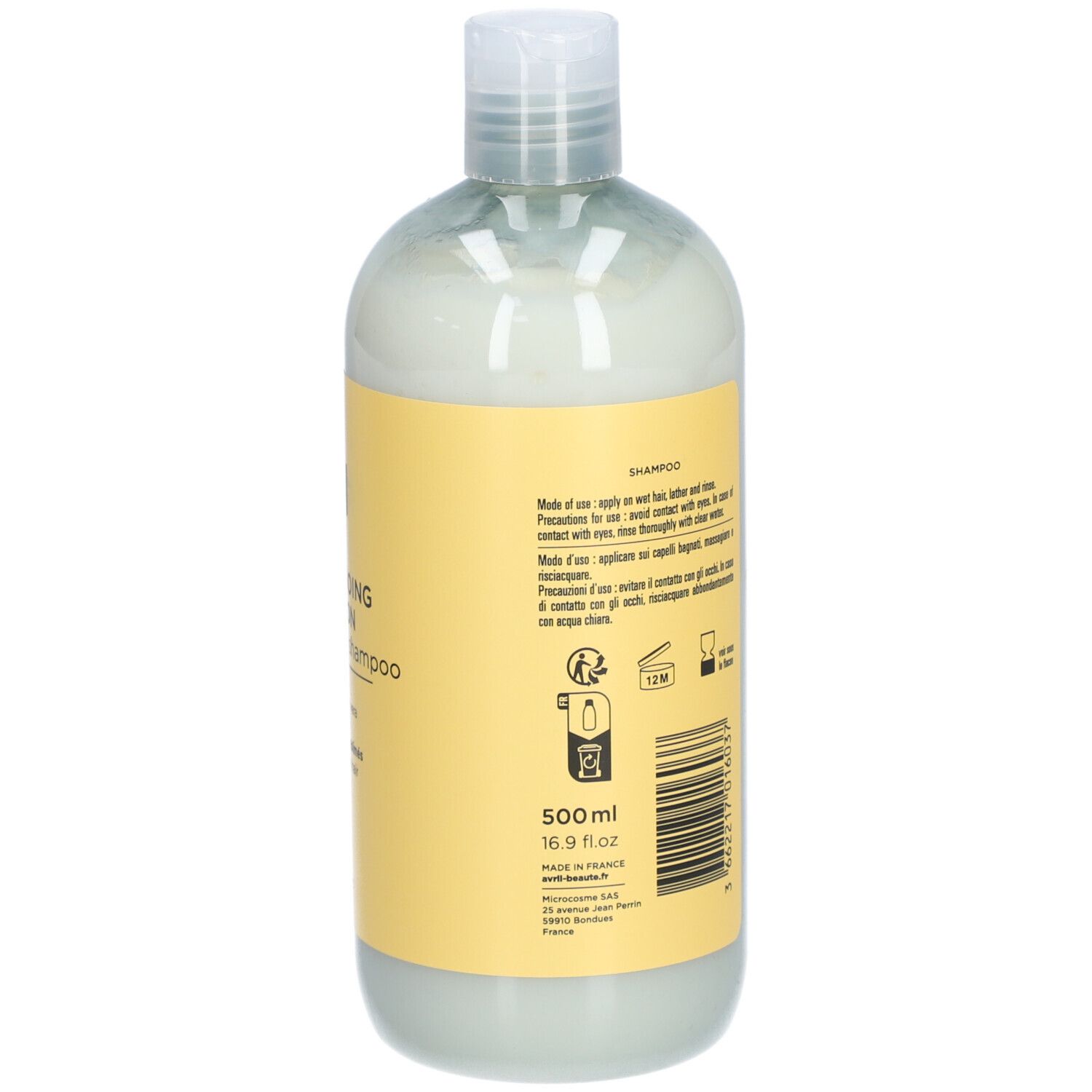 Dos du flacon de Shampooing Nutrition. Texte sur étiquette jaune. 500ml. Instructions et code-barres.