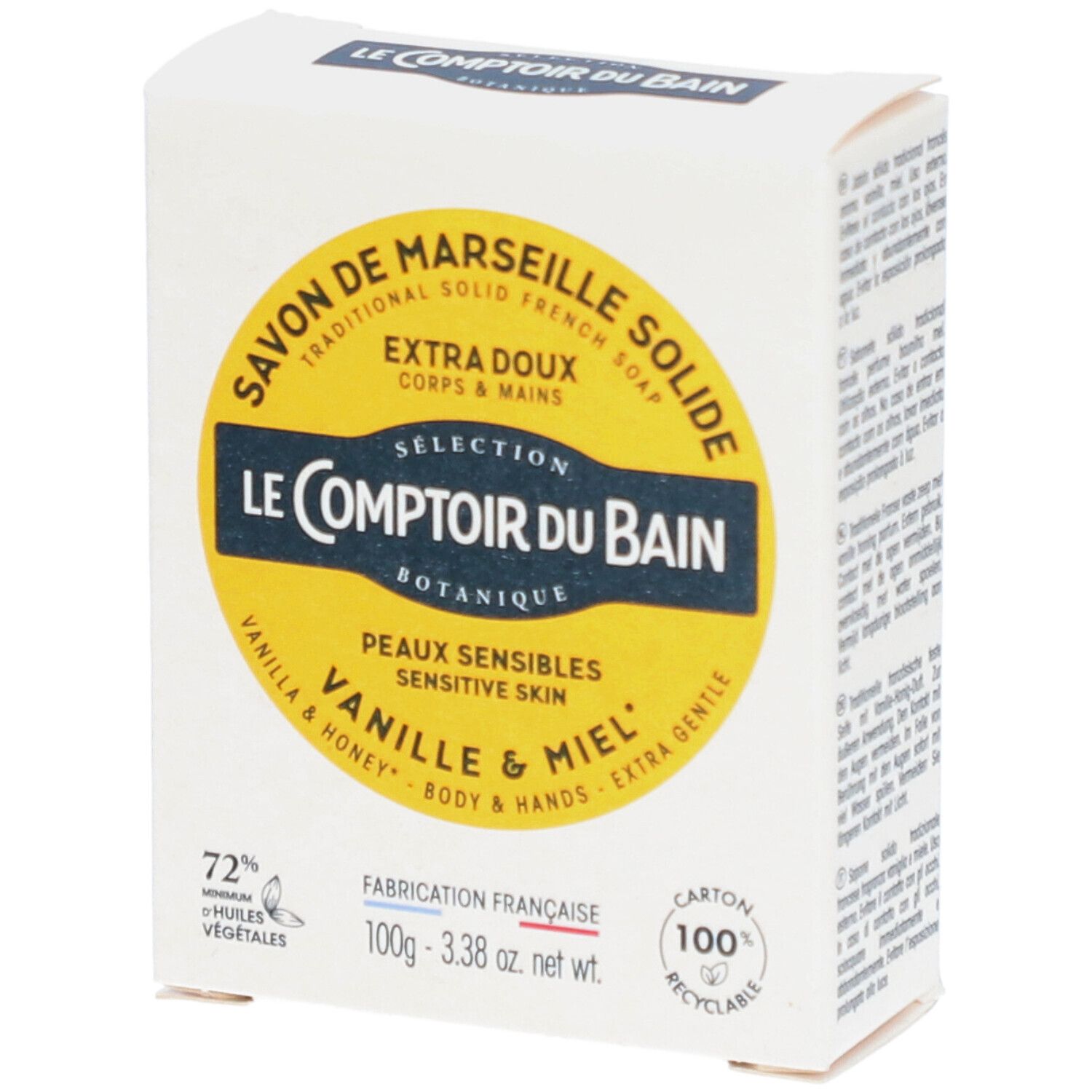 Boîte avec étiquette jaune. Inscription: Savon de Marseille, Vanille & Miel. 100g, 72% Huiles Végétales.