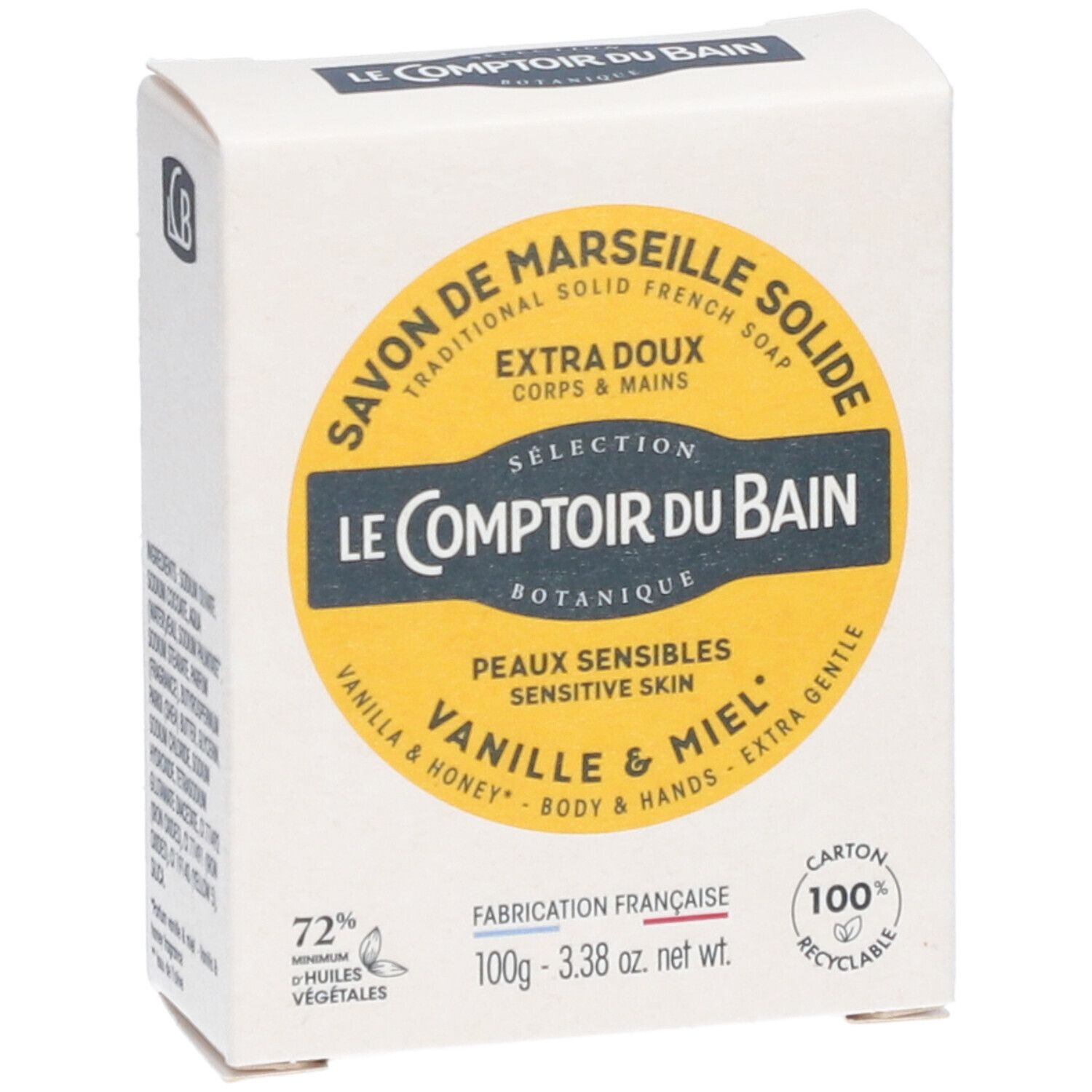 Boîte avec étiquette jaune. Inscription: Savon de Marseille, Vanille & Miel. 100g, 72% Huiles Végétales.