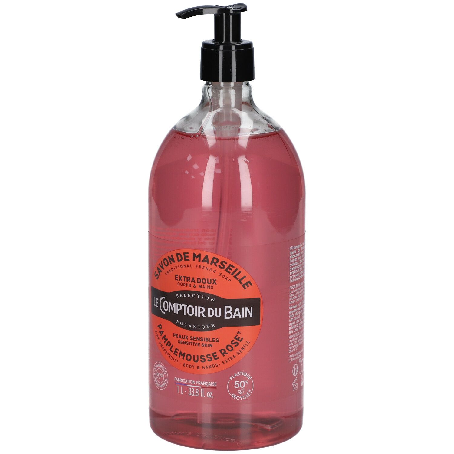 Flacon transparent de savon liquide rose avec pompe noire. Étiquette avec informations produit.