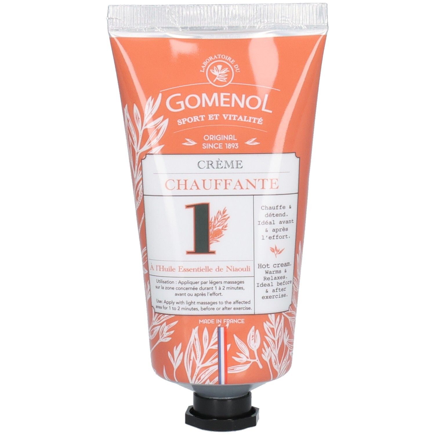 Tube de crème orange. Inscriptions: GOMENOL, CRÈME CHAUFFANTE. Motif floral et texte en français.