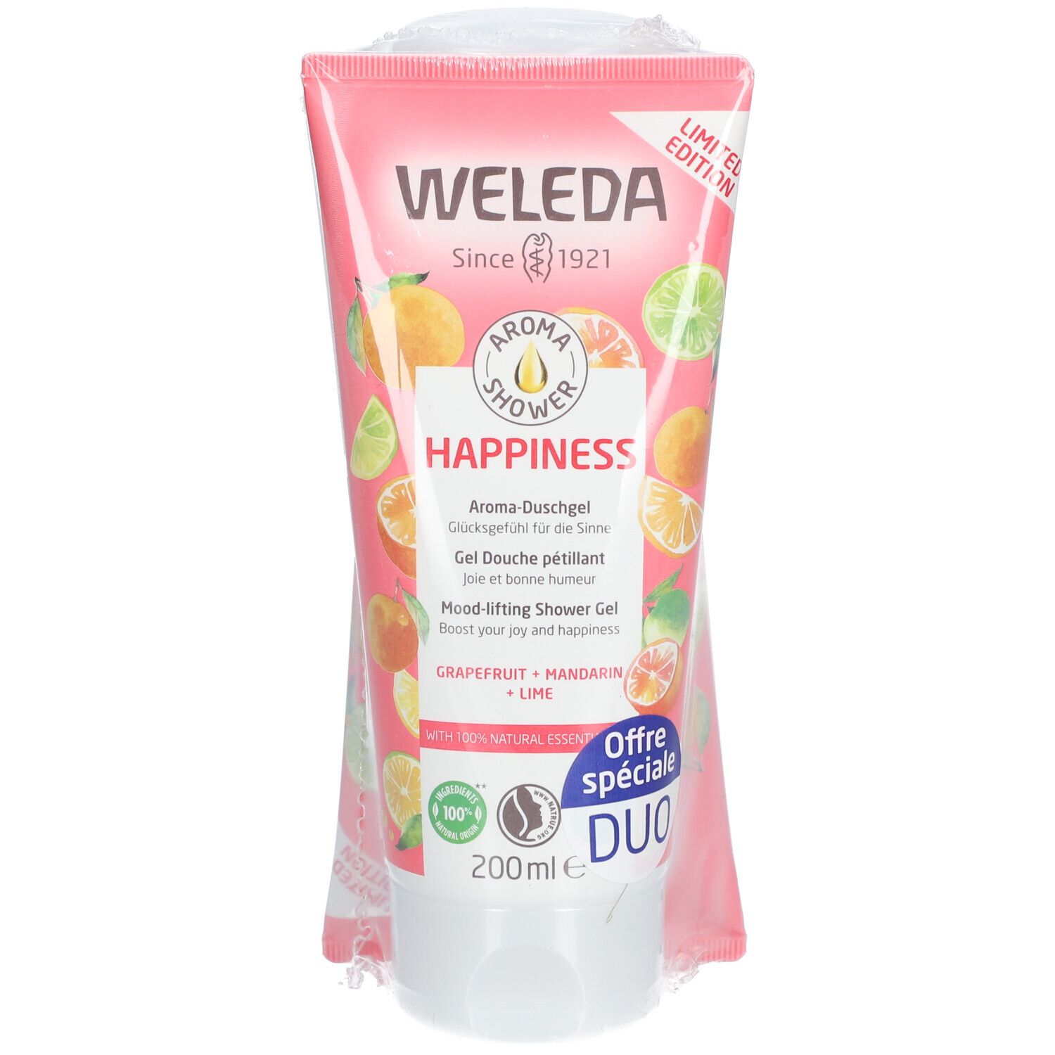 Tube rose WELEDA "Aroma Shower Happiness". Illustrations d'agrumes. Mention "DUO". Edition limitée.