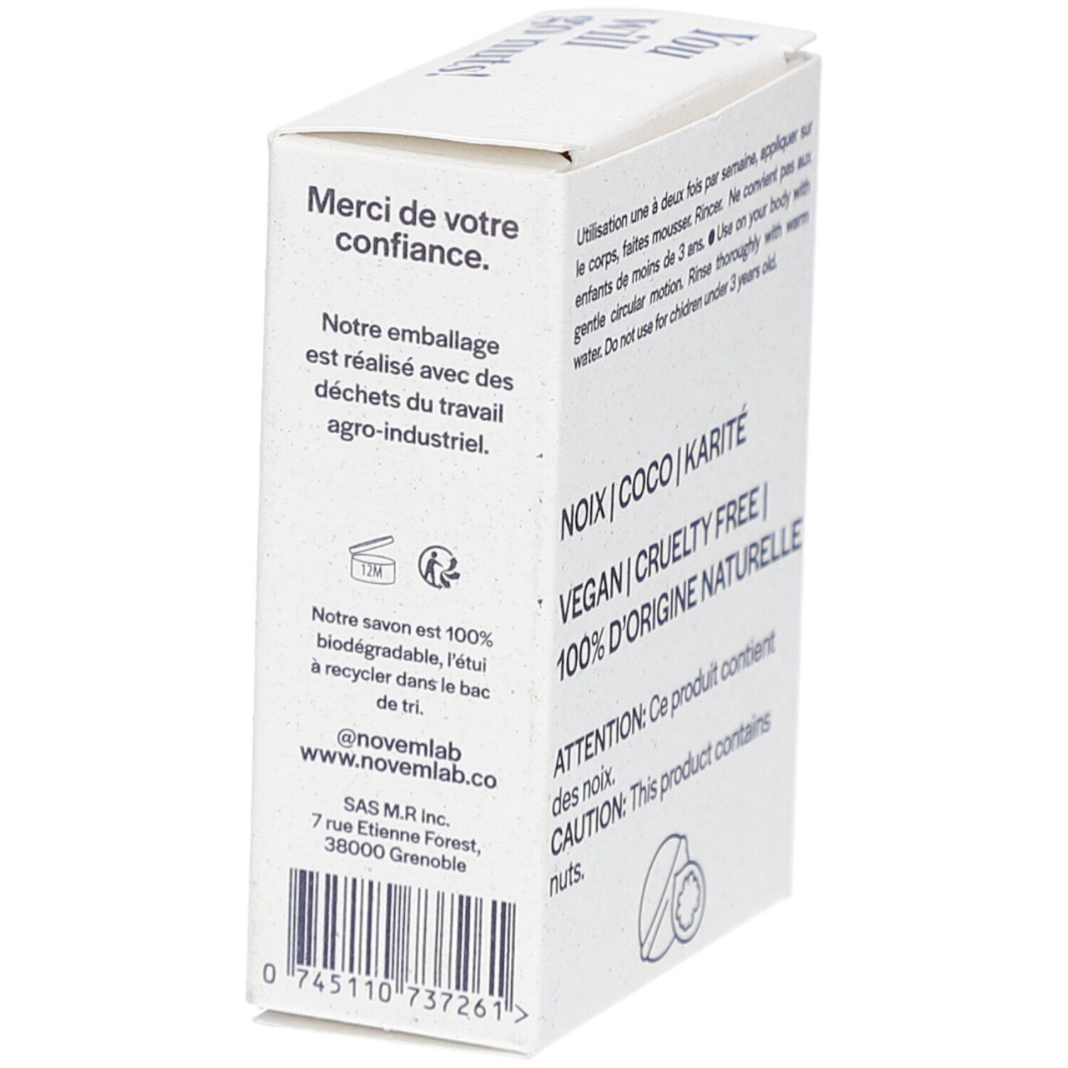 Boîte en carton blanche. Inscriptions: novëm, www.novem.lab, 100% biodégradable. Code-barres. Texte: Merci de votre confiance.