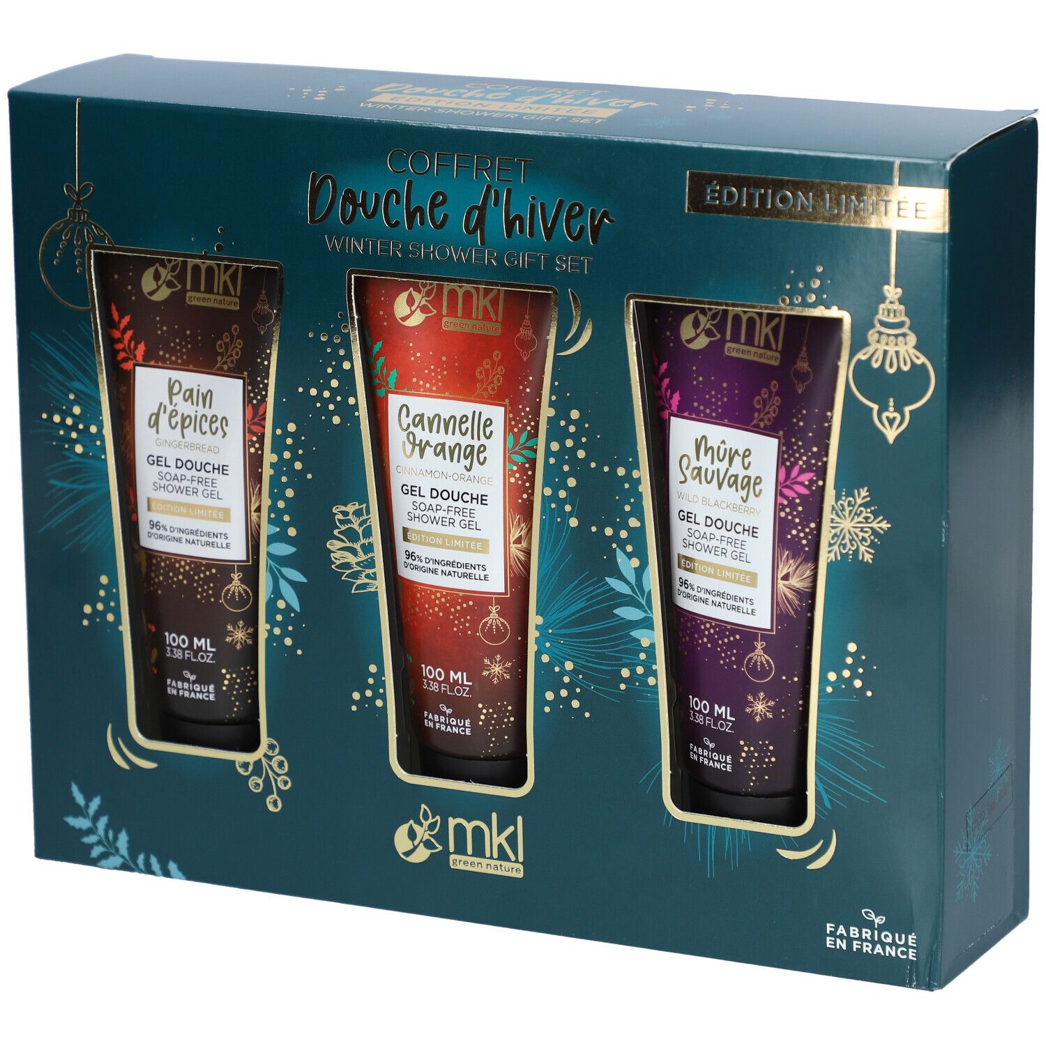 Coffret cadeau de douche d'hiver avec trois gels douche. Chaque gel a une couleur et une inscription différentes. L'emballage est bleu foncé avec des accents dorés.