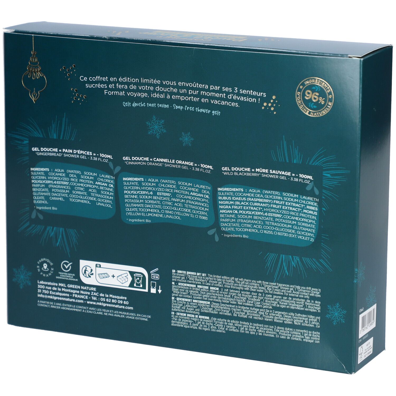 Dos du coffret cadeau avec texte et informations sur le contenu. La boîte est bleu foncé avec des accents dorés. Un label de qualité vert est également visible.