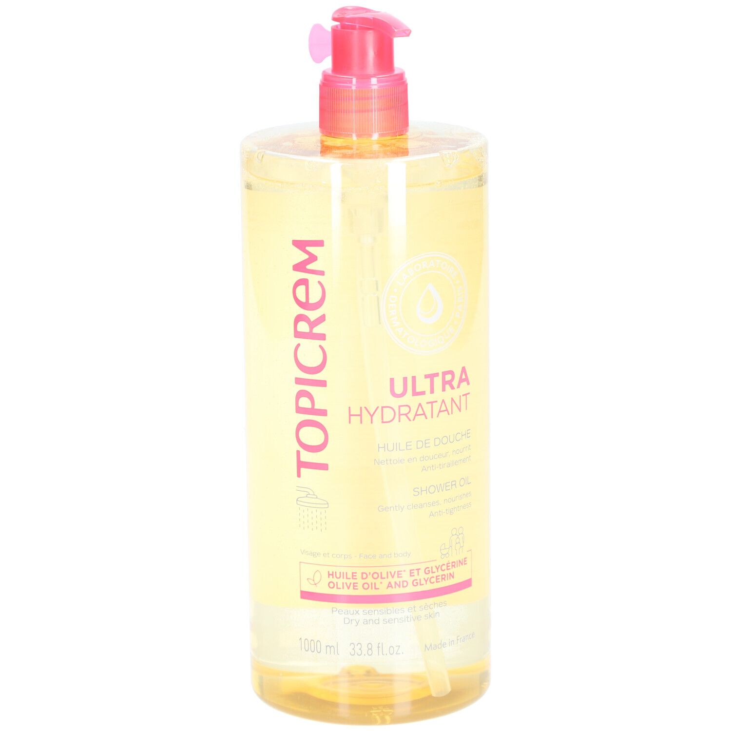 Flacon transparent avec liquide jaunâtre. Bouchon pompe rose. Inscription : Topicrem Ultra Hydratant Huile de Douche.