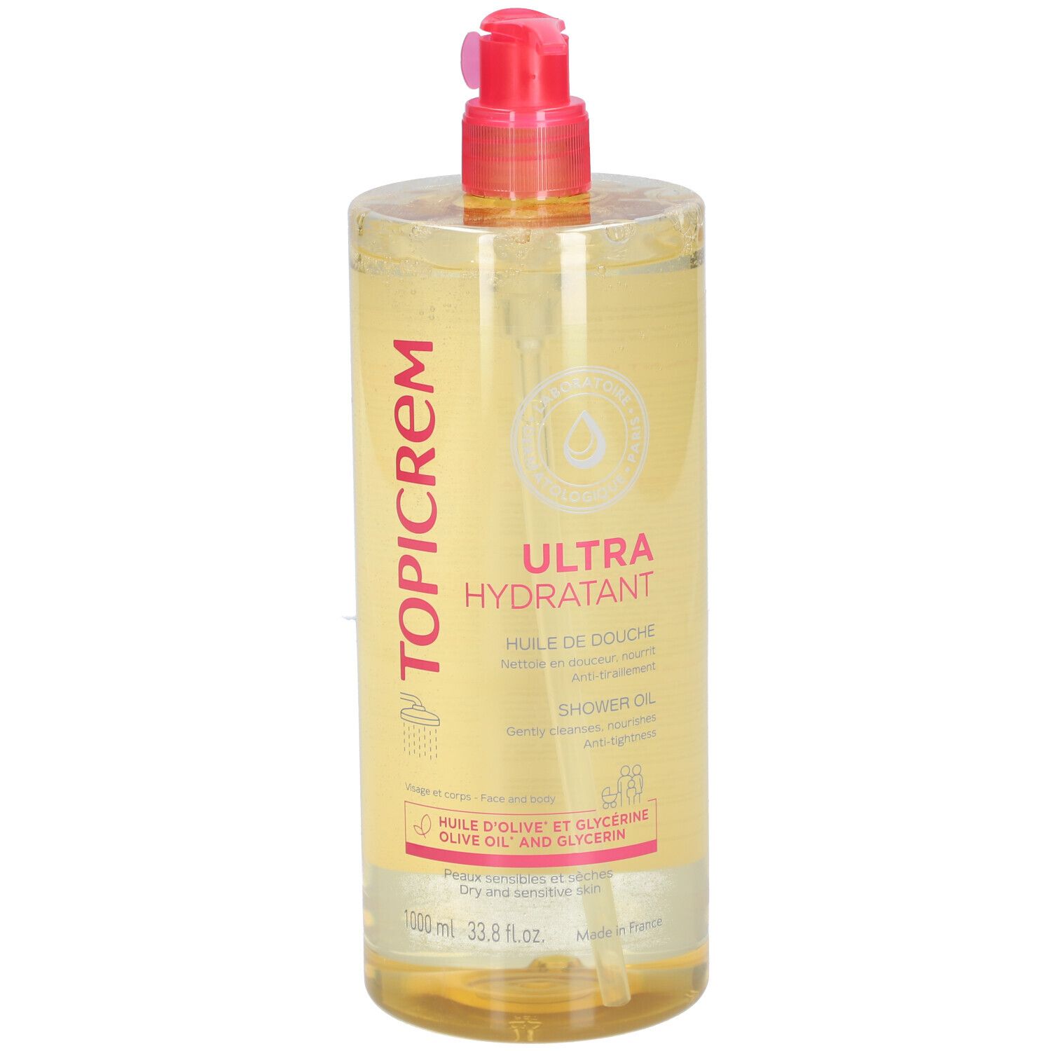Flacon transparent avec liquide jaunâtre. Bouchon pompe rose. Inscription : Topicrem Ultra Hydratant Huile de Douche.