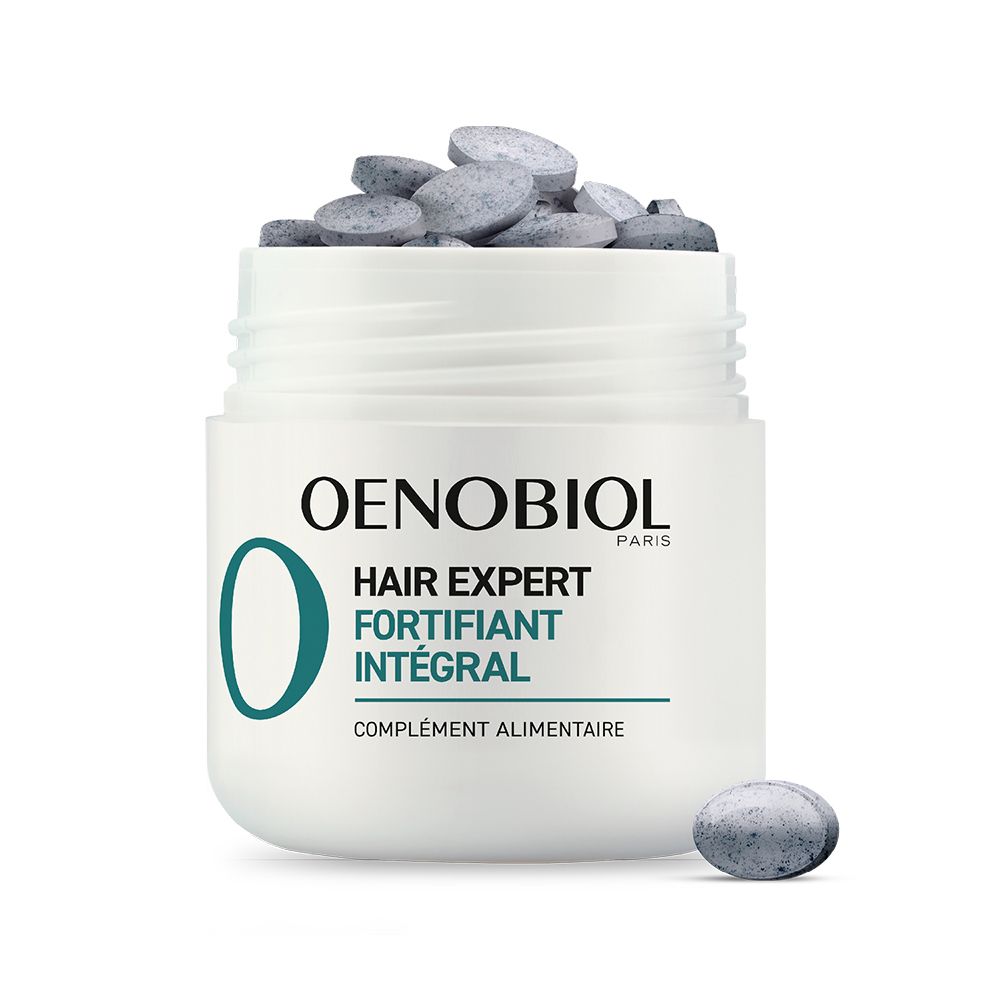 Pot blanc avec comprimés. Logo OENOBIOL et texte: Hair Expert Fortifiant intégral. Complément alimentaire.