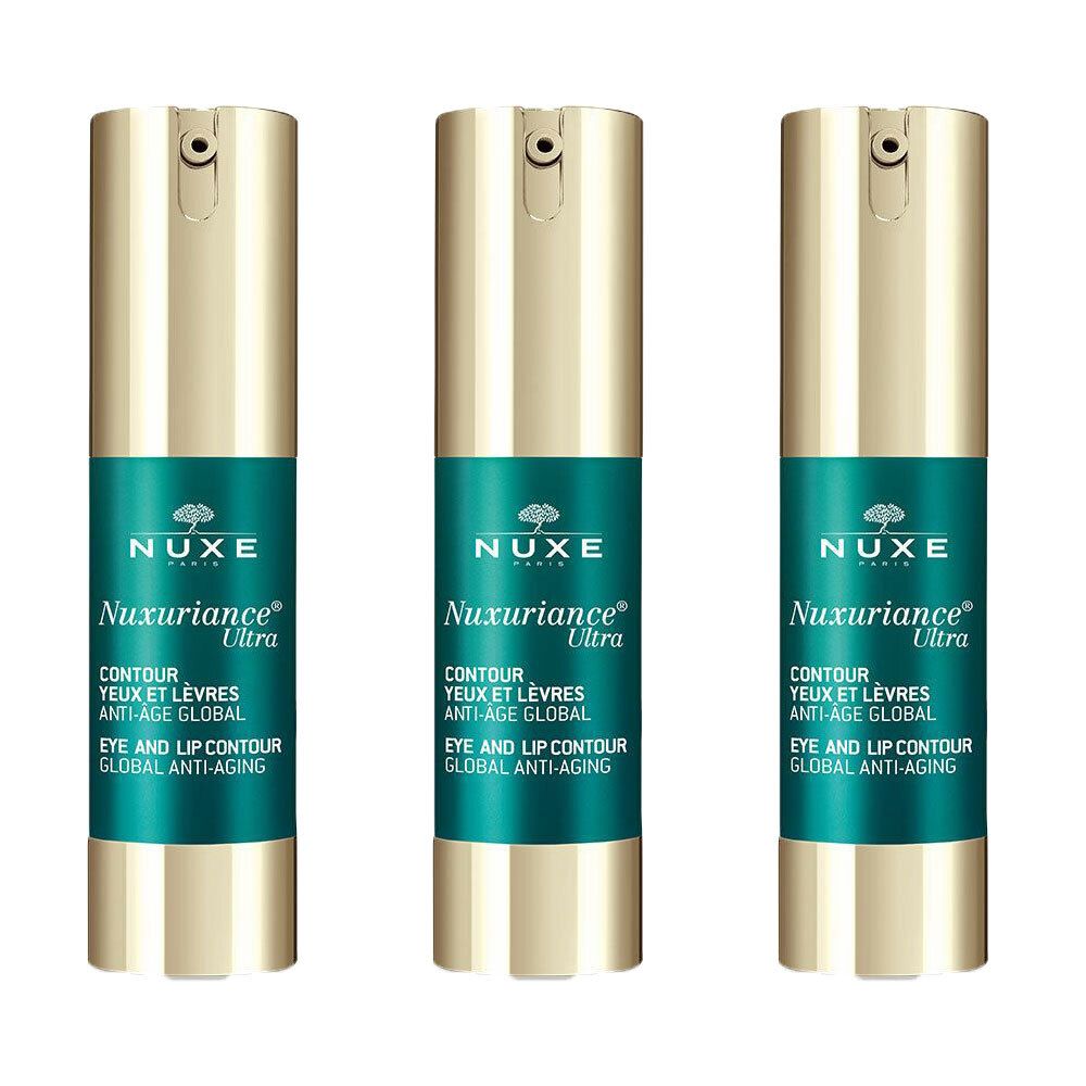 Trois flacons cylindriques avec bouchons dorés et étiquettes vertes. Les étiquettes indiquent "Nuxe Nuxuriance Ultra" et "Eye and Lip Contour".