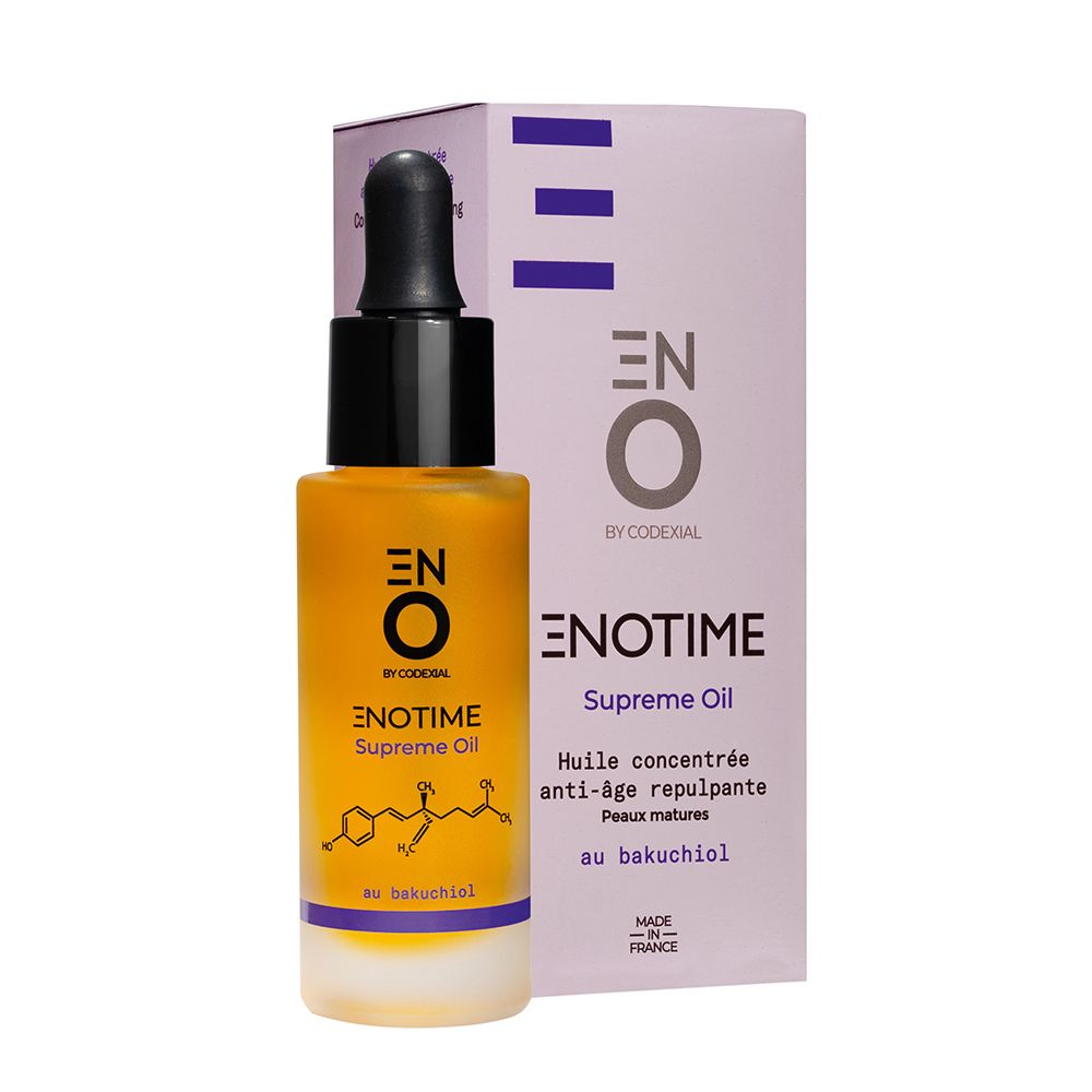 Flacon d'huile jaune avec pipette noire et emballage. Inscription : Enotime Supreme Oil.
