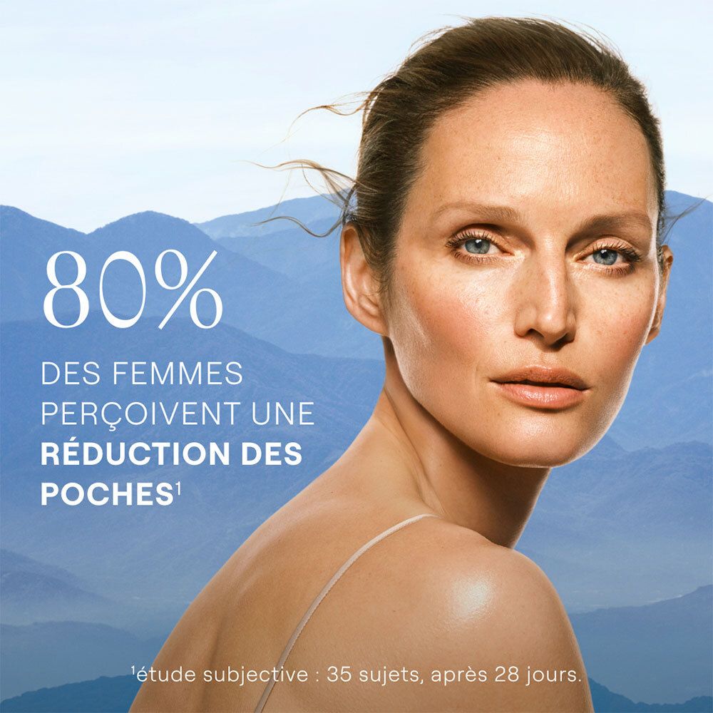 Femme à la peau claire. Texte: 80% des femmes perçoivent une réduction des poches. Étude après 28 jours.