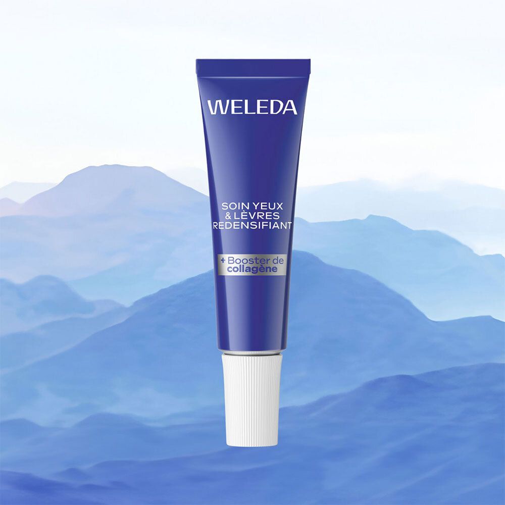 Tube bleu avec bouchon blanc. Fond: montagnes. Inscription: WELEDA, SOIN YEUX & LÈVRES REDENSIFIANT, + Booster de collagène.