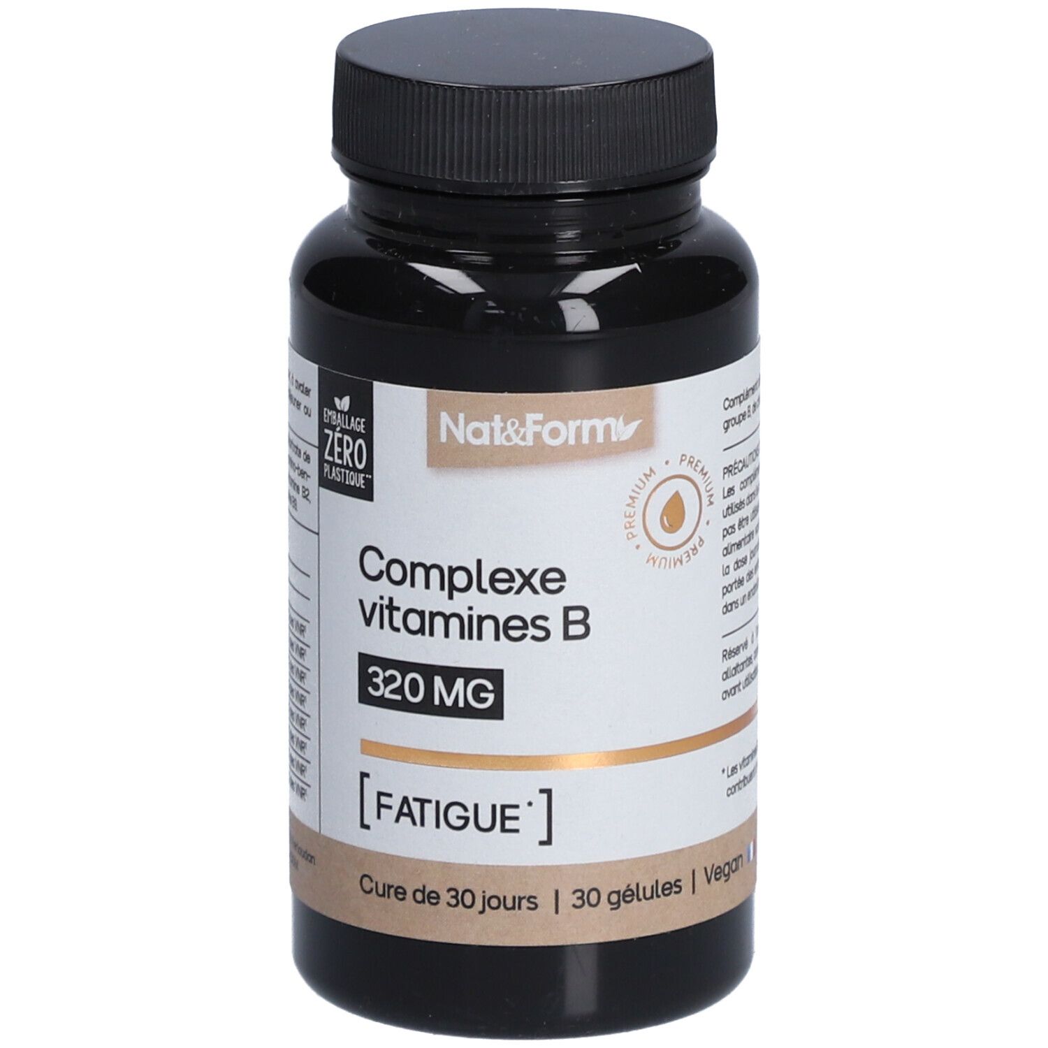 Flacon marron avec bouchon noir. Inscription: Complexe vitamines B, 320 MG, [FATIGUE].