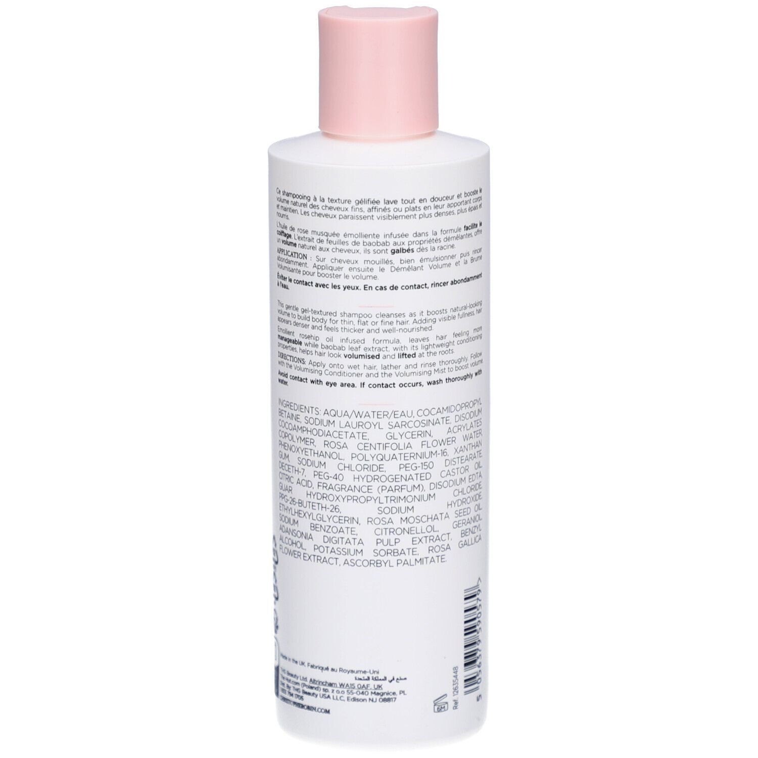 Dos d'un flacon blanc avec bouchon rose. Texte et ingrédients en plusieurs langues. Code-barres et informations de production.