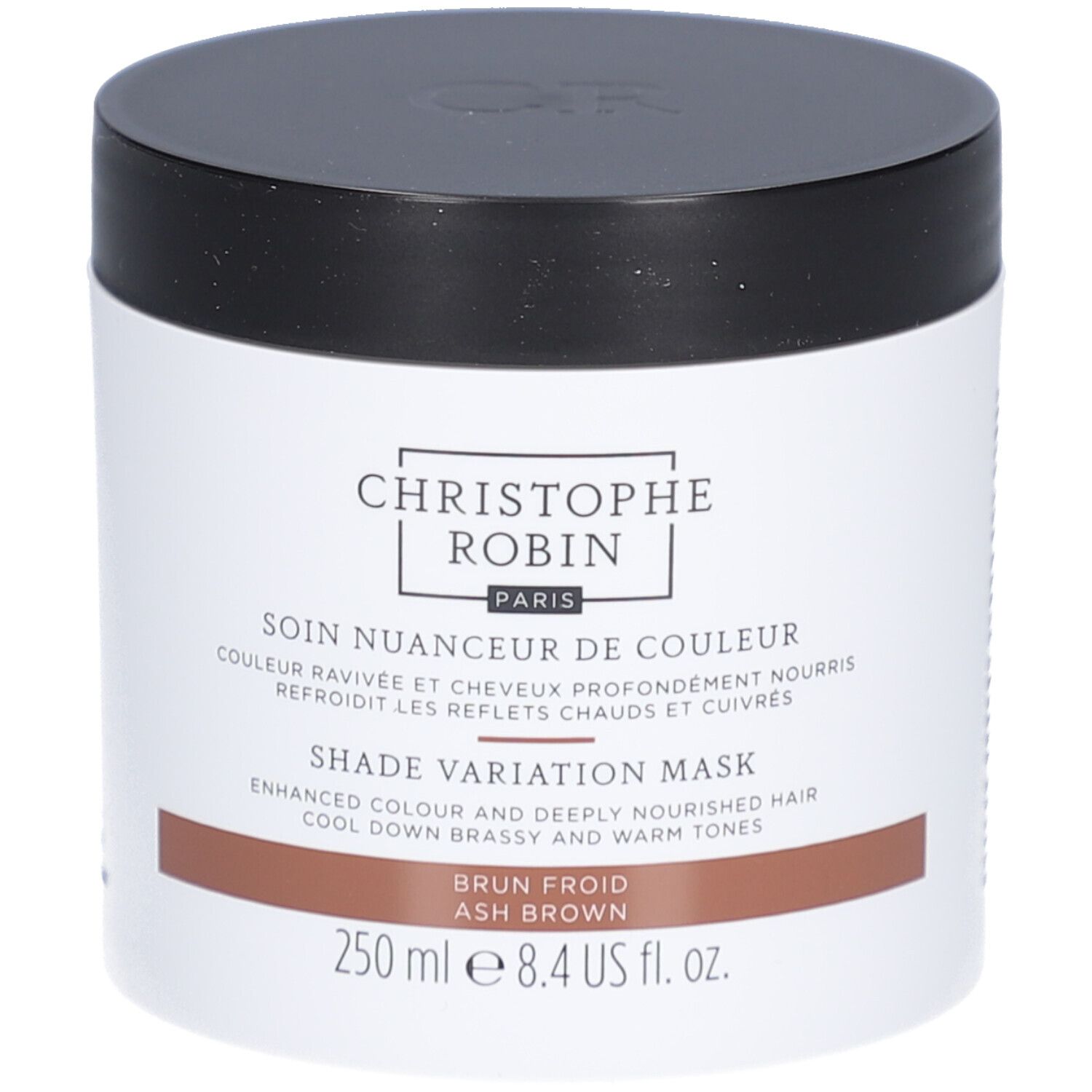 Pot blanc avec couvercle noir. Inscription: Christophe Robin, Shade Variation Mask. Bande marron.